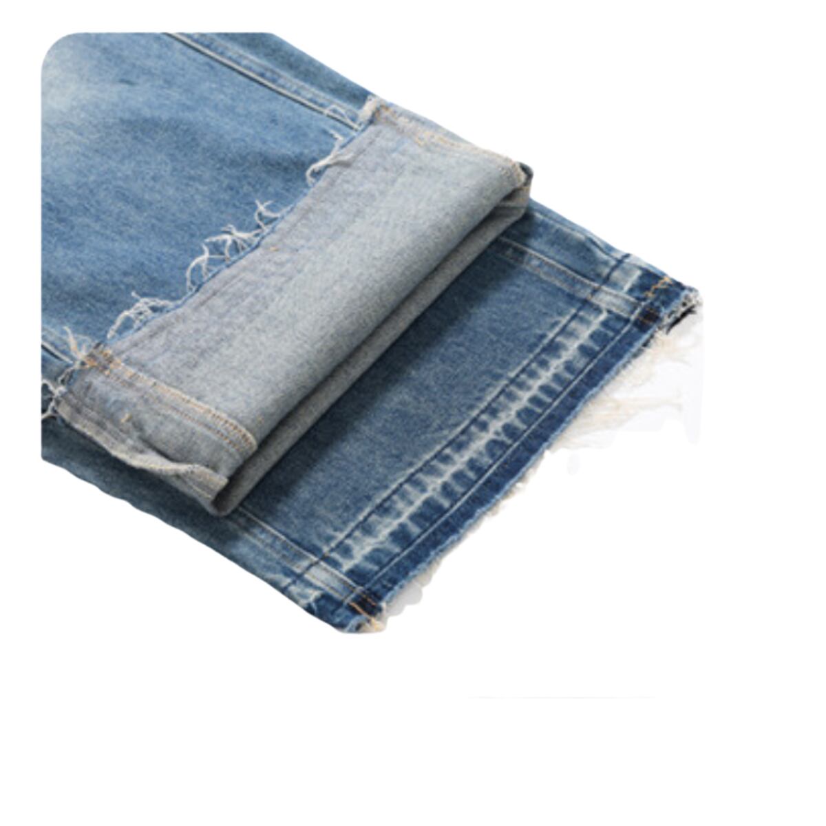 カットオフ加工（切りっぱなし仕様）の裾で、自然なほつれ感を演出