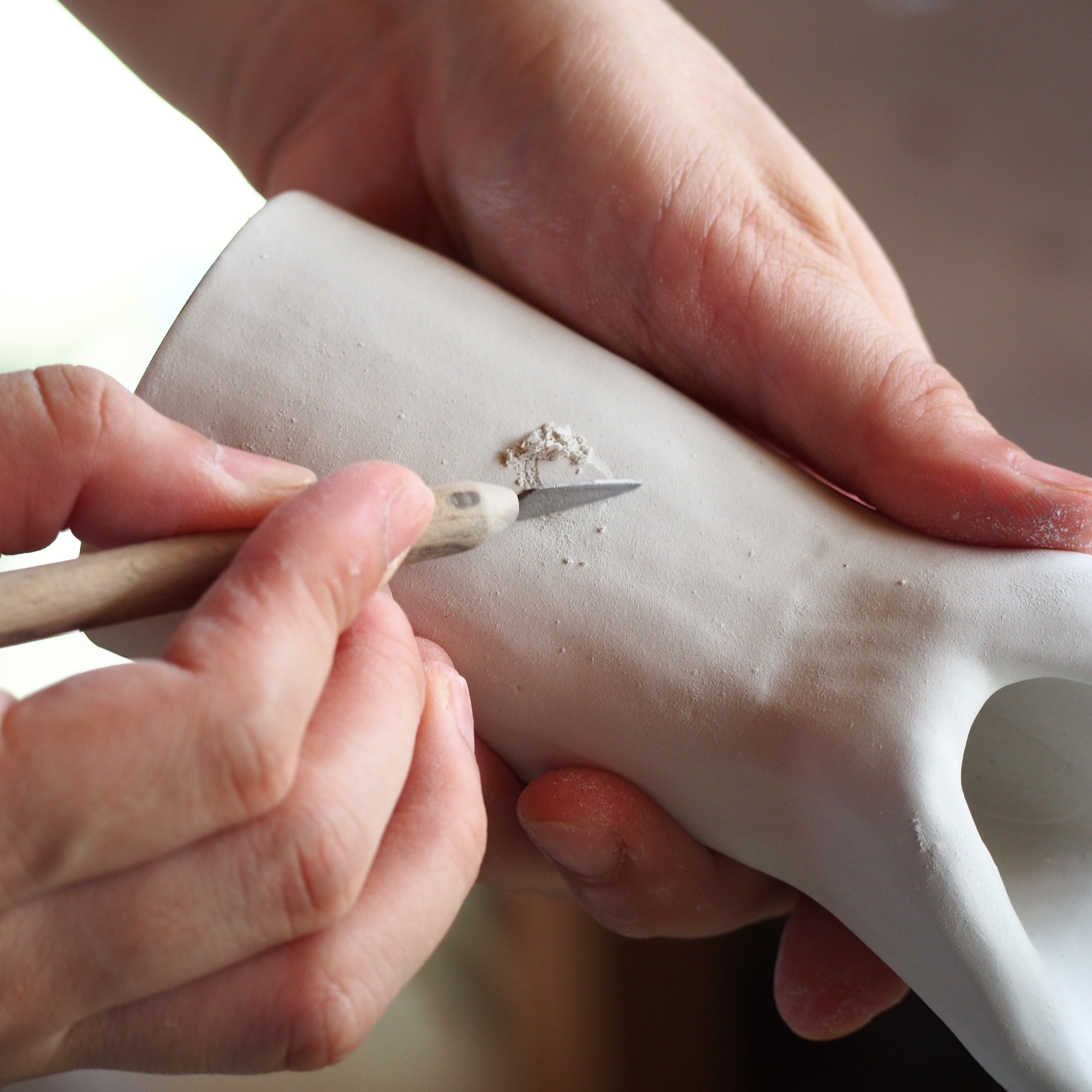 釉薬のデコボコをならします。