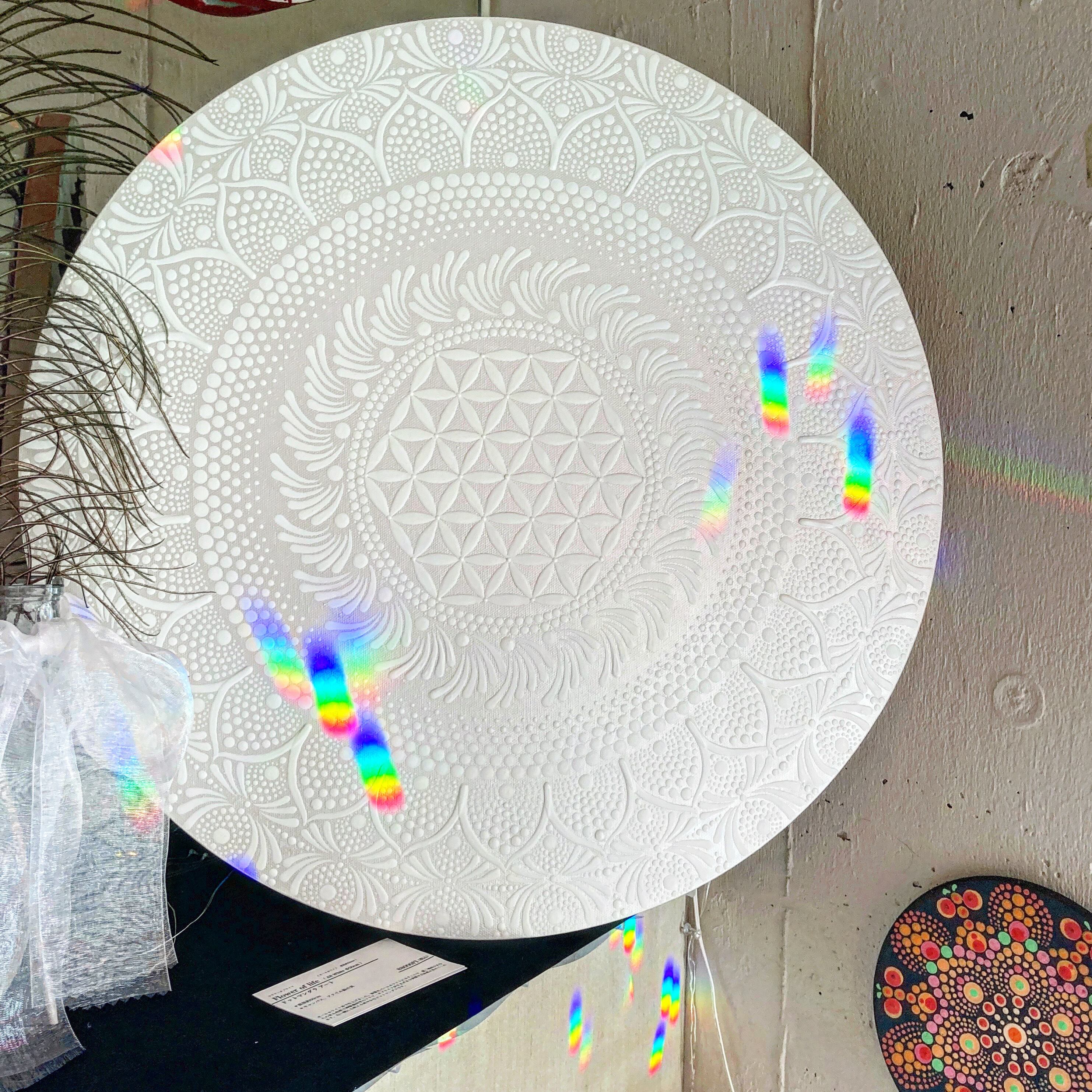 サンキャッチャーの虹色の光