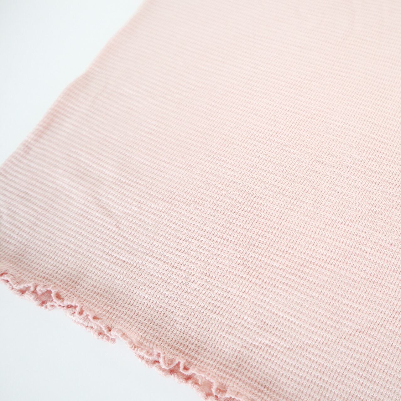 軽やかなワッフル生地。裾はかわいいメロー加工