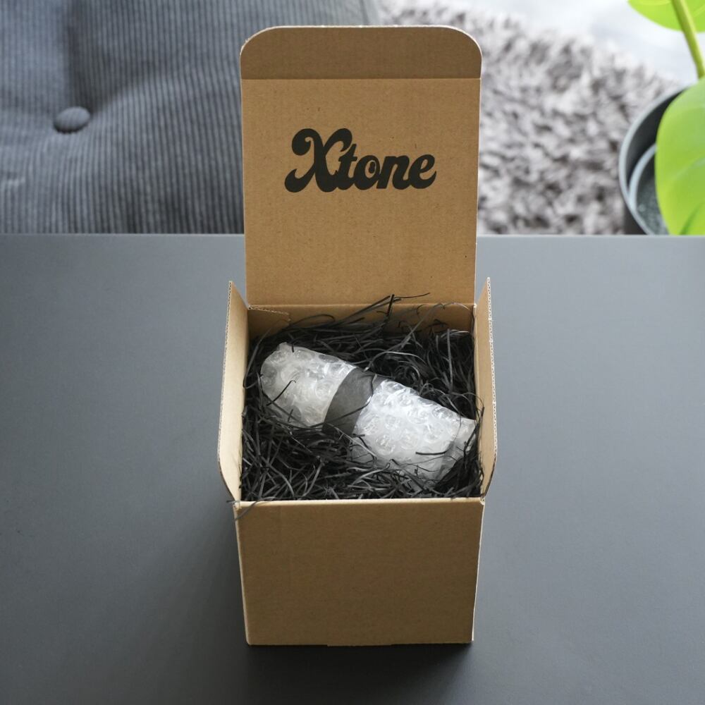 ボックスにクッションを敷いて梱包