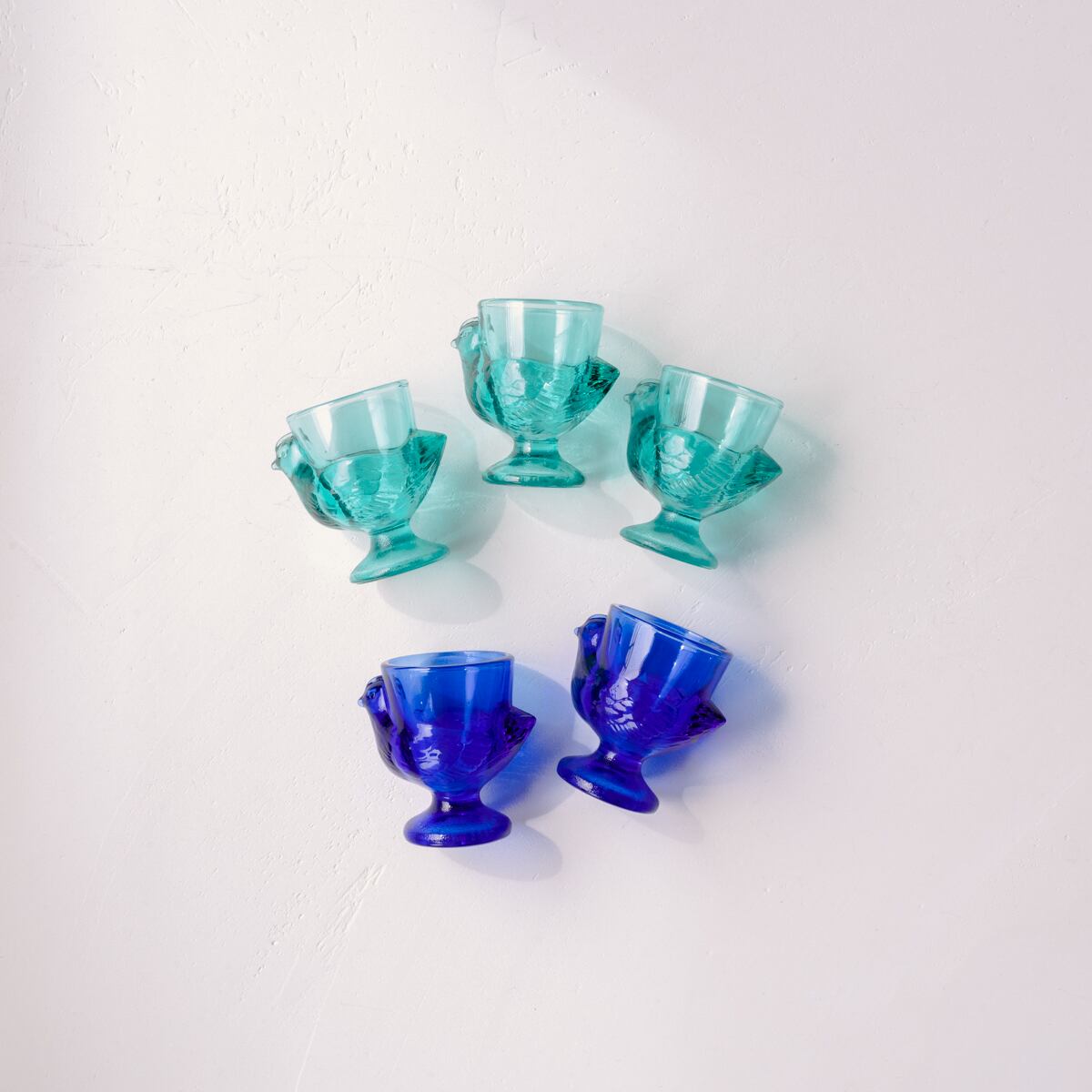 Clear Egg Stand supported by birds