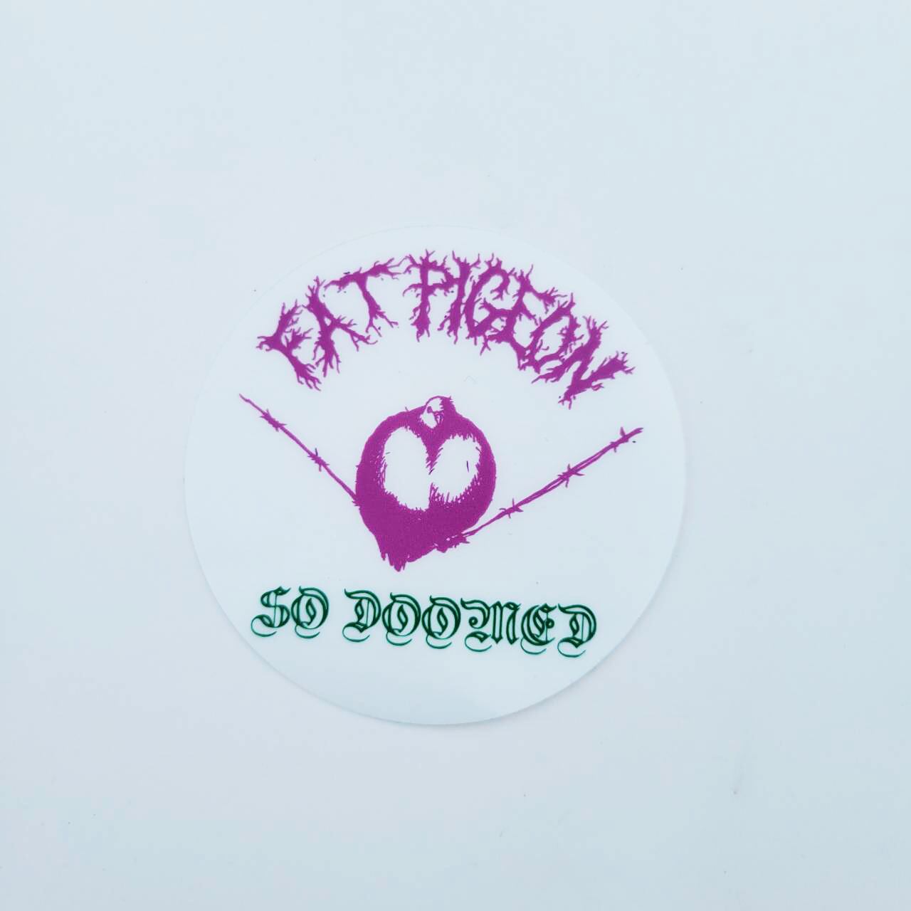 FAT PIGEON RECORDS KOOZIE "EYE FOR AN EYE" (GLOW IN THE DARK) + STICKER