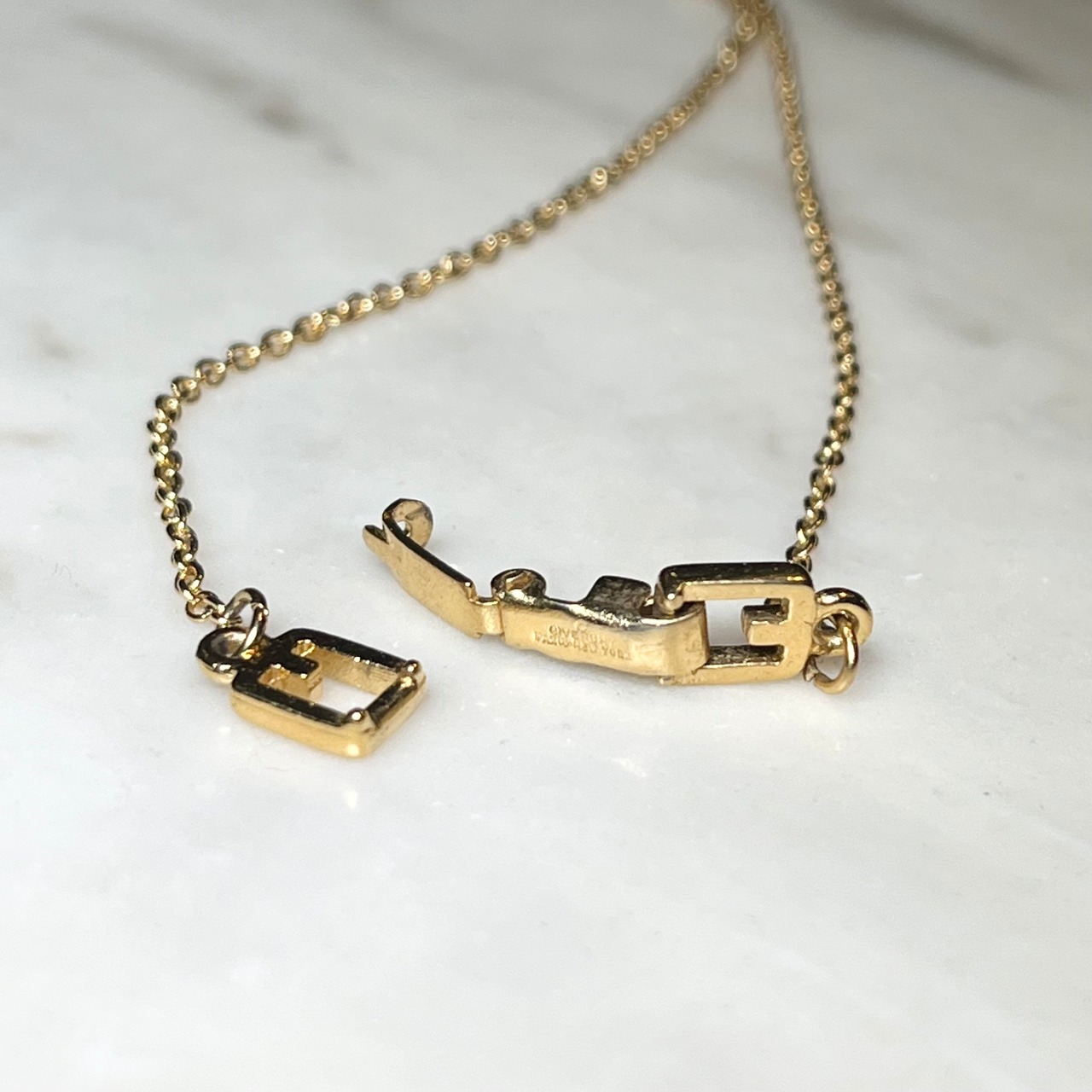 vintage GIVENCHY gold color metal "G" pendant necklace