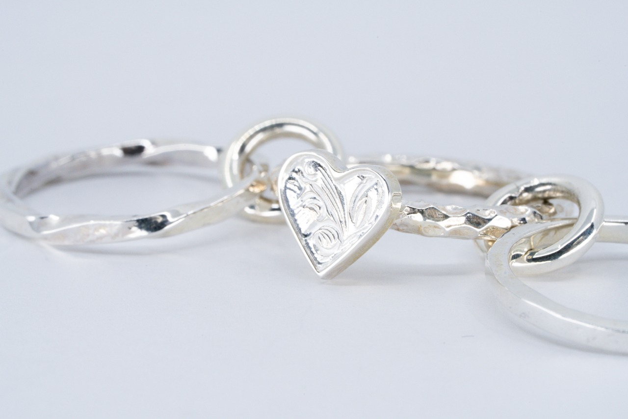 R-122 Three linked Arabesque Heart Ring