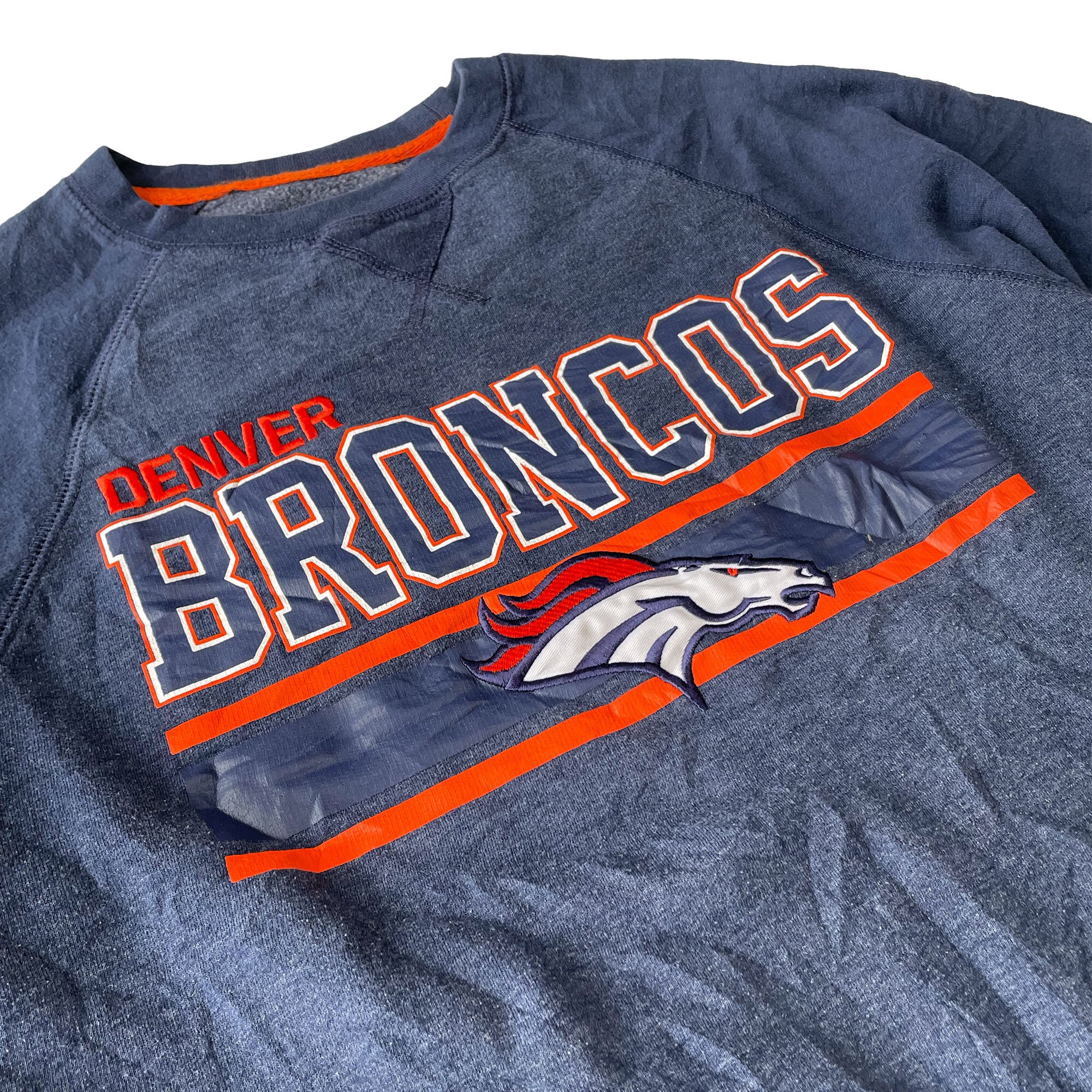 古着》NFL TEAM APPAREL デンバー・ブロンコス チームロゴ 古着》NFL TEAM APPAREL デンバー・ブロンコス チームロゴ