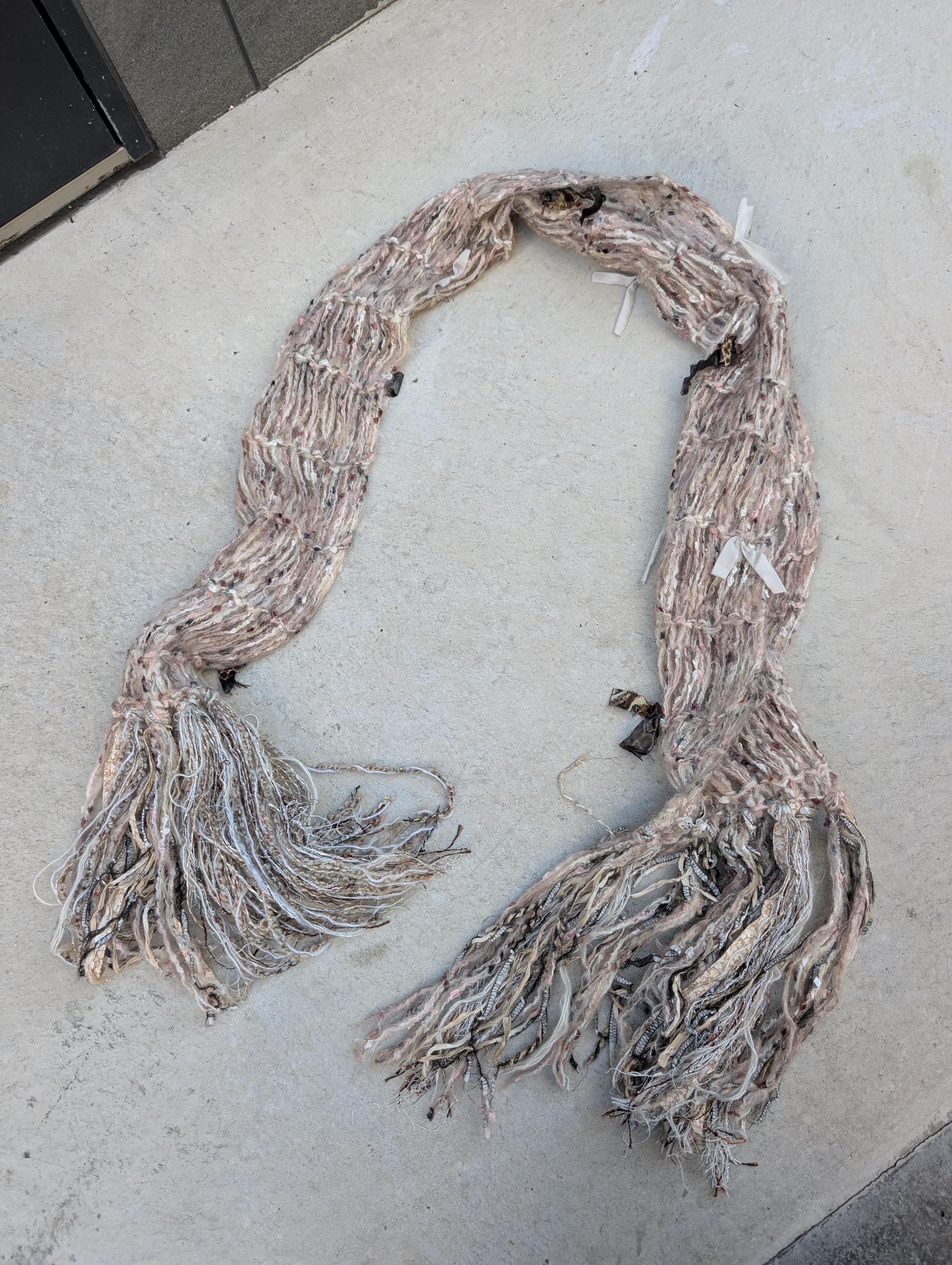 "RIBBON DESIGN MUFFLER"