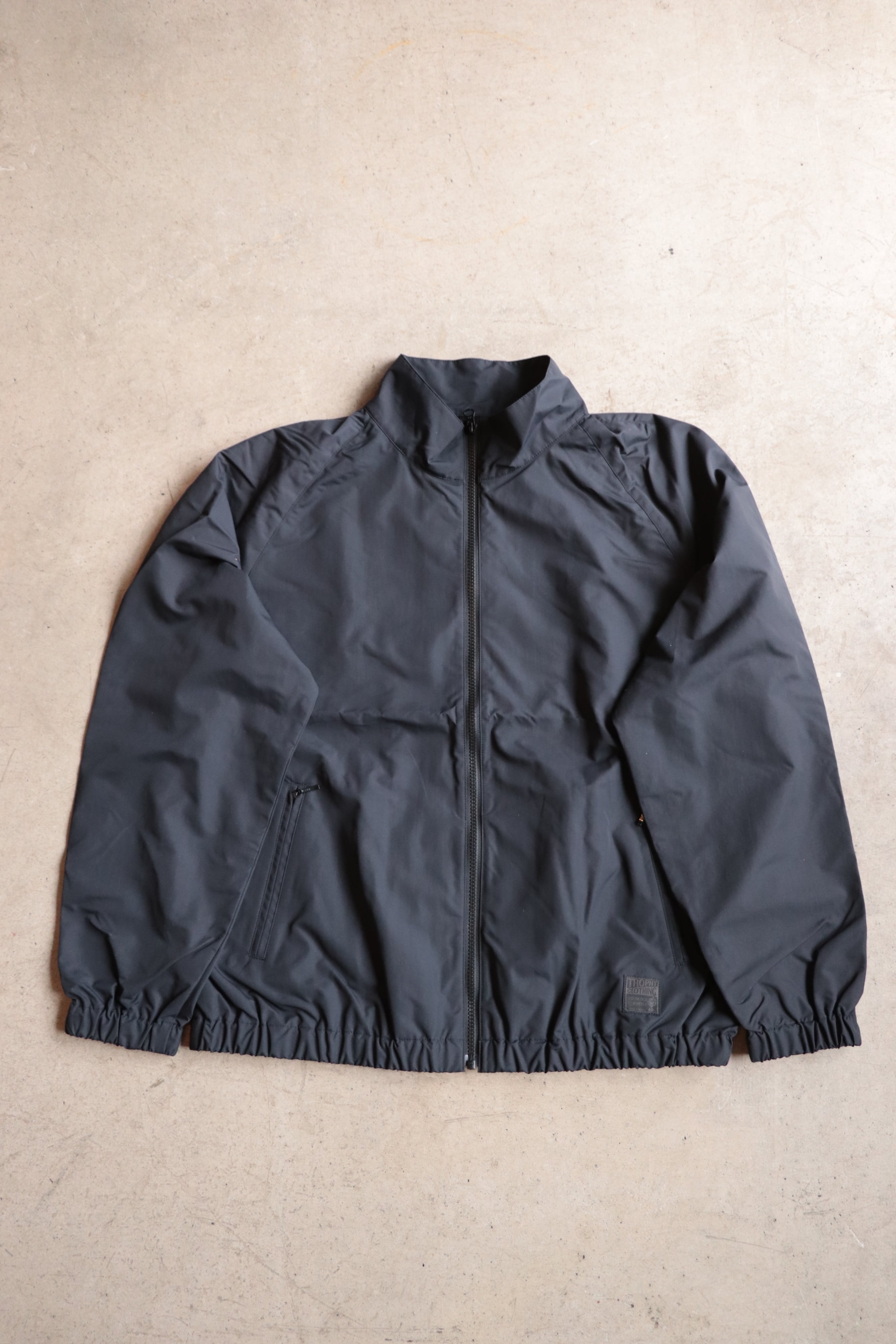 TROPHY CLOTHING/トロフィークロージング “MONOCHROME” TRACK JACKET