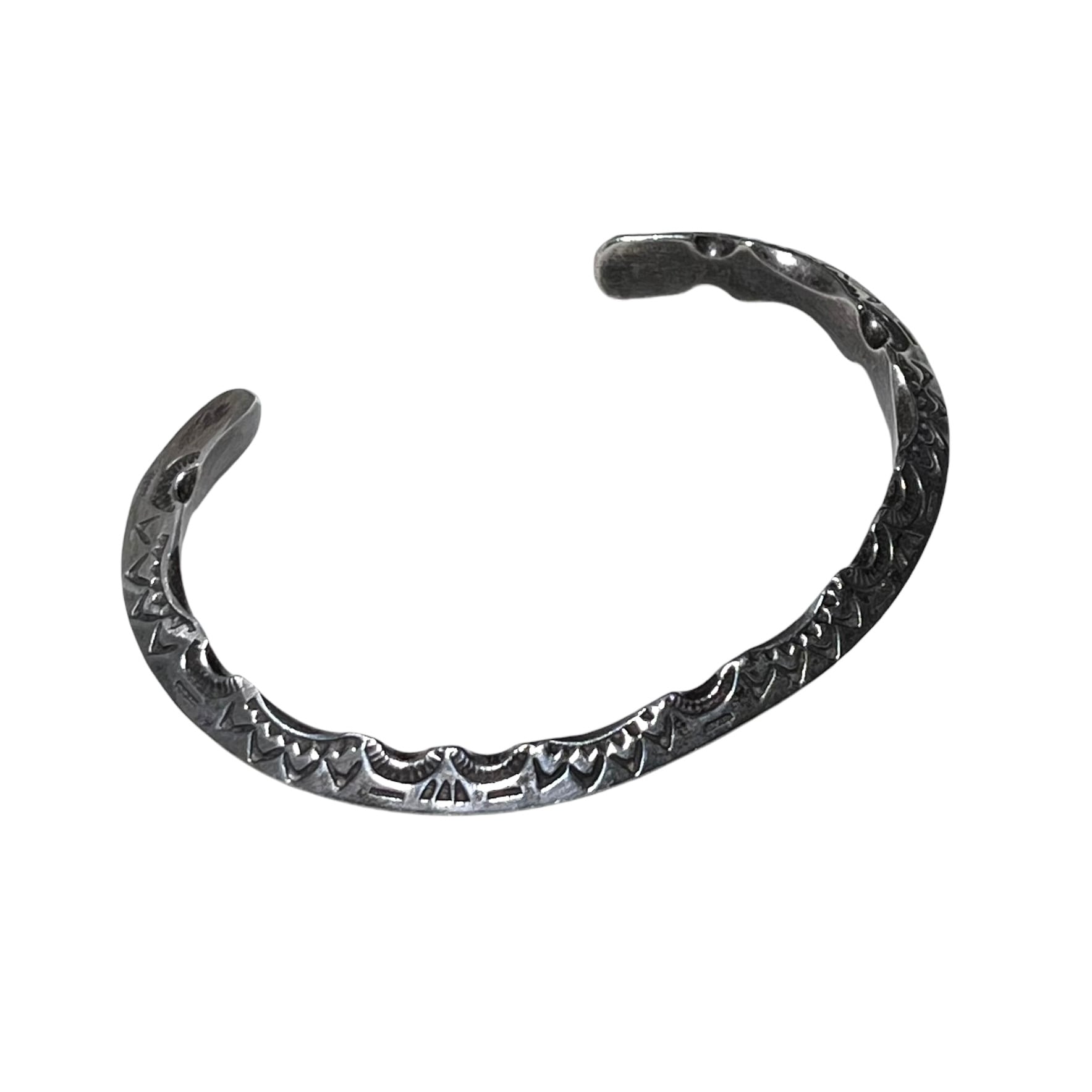Ray Adakai silver stamped bangle | NOIR ONLINE
