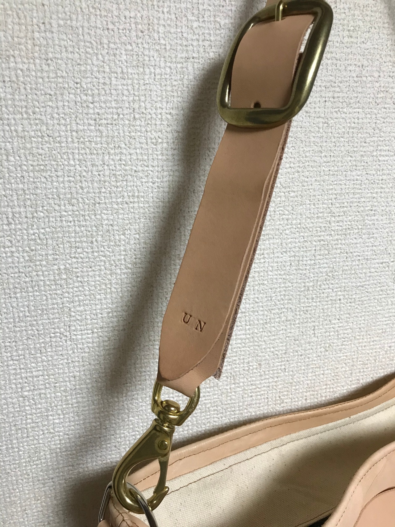 UNFINISHEDレザーショルダーバッグ