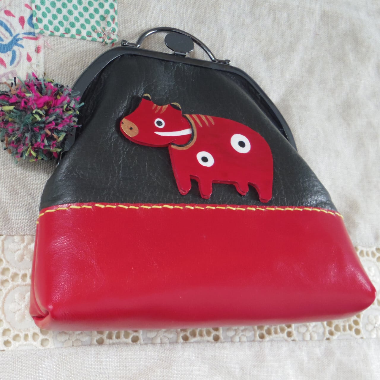 がまぐちポーチ「ゆらゆらあかべこ」 | polym