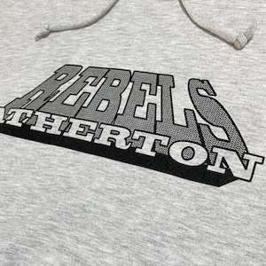 【JERZEES】ロゴ プリント REBELS ATHERTON スウェット パーカー フーディー hoodie プルオーバー XL ビッグシルエット グレー us古着