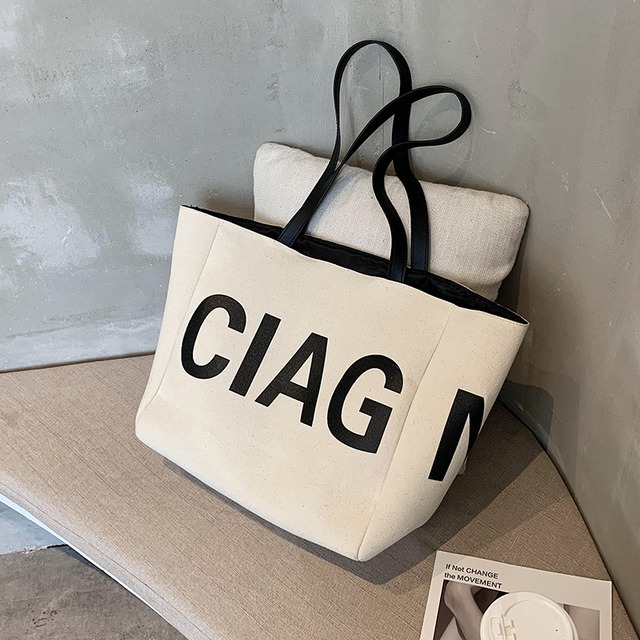 大容量バッグハンドバッグ2020新しいトレンディな夏のネットレッドキャンバスショルダーバッグバージョンのウエスタンスタイルのワイルドトートバッグ Tiancai_Wing_Bag9714270