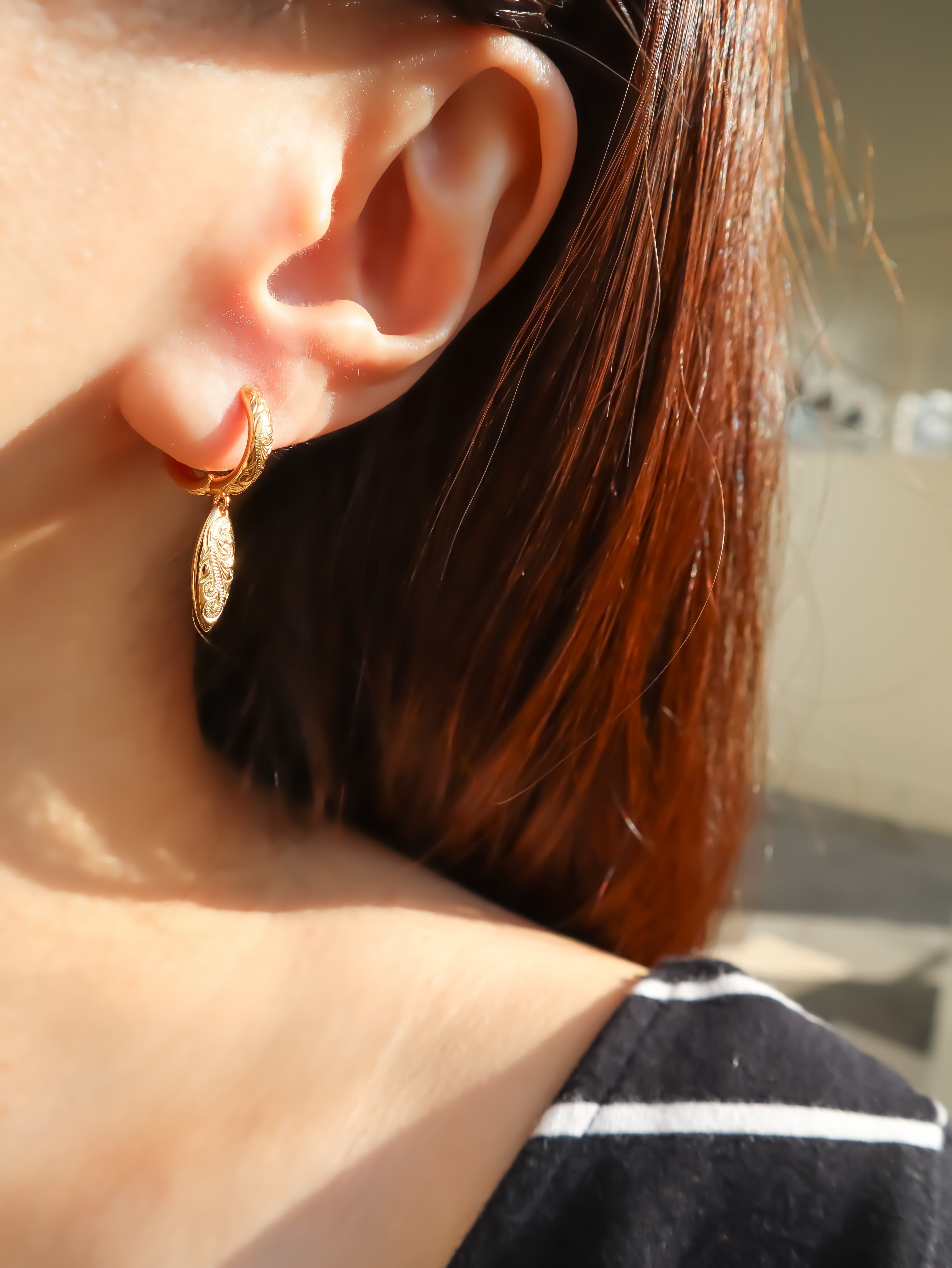 Surfboard hoop pierce