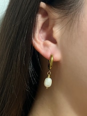 Fresh pearl hoop pierce