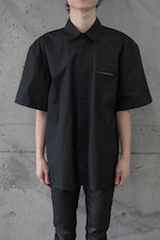 Black short-sleeved shirt with badge