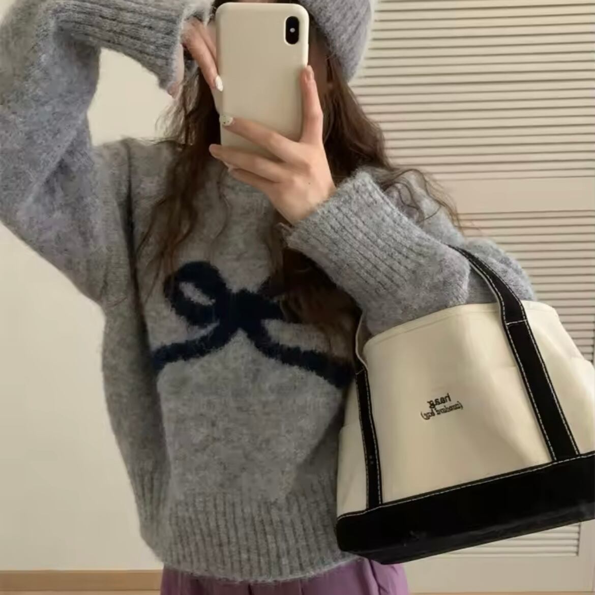 クルーネックリボンニット