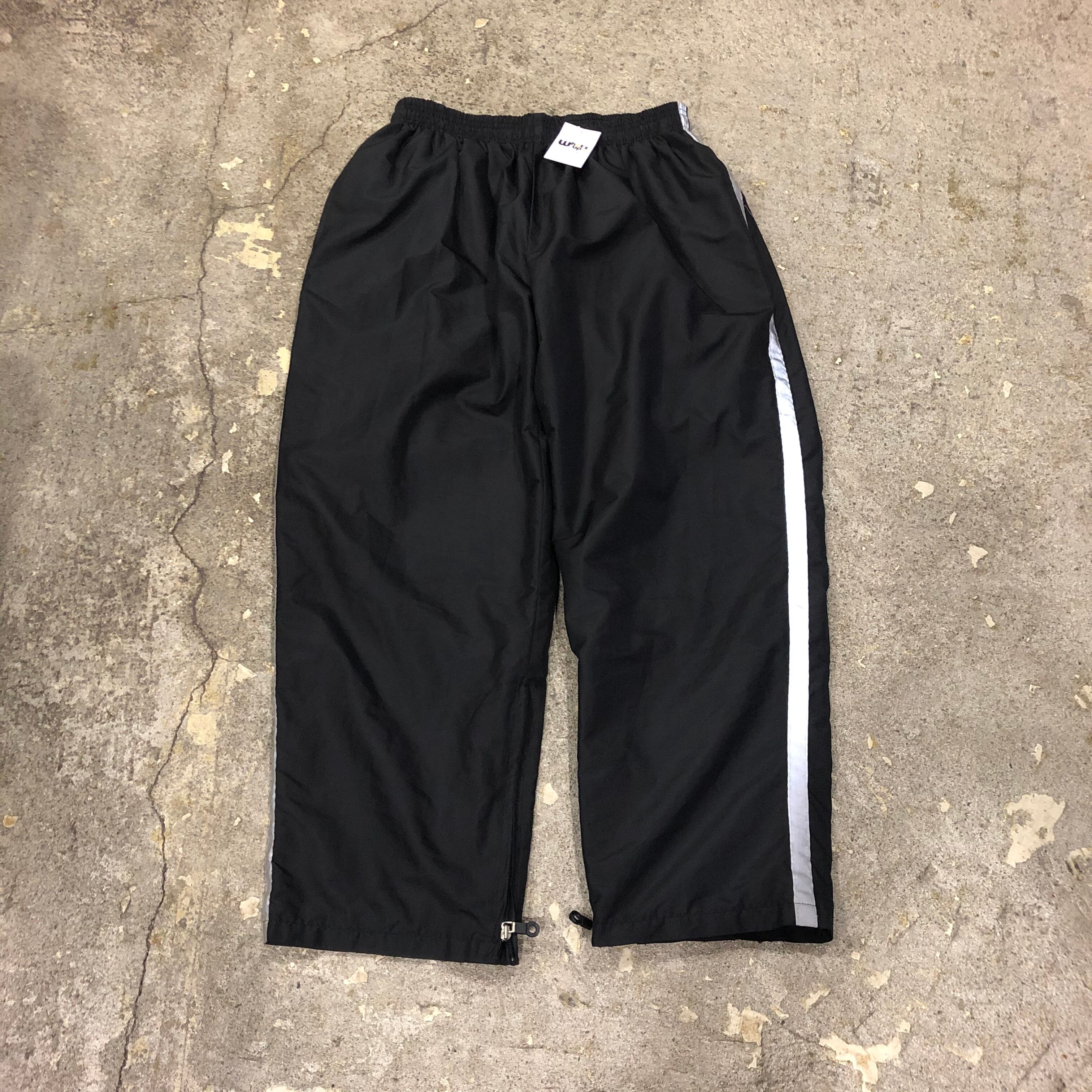 90s Stussy Sport reflector line nylon pant | What
