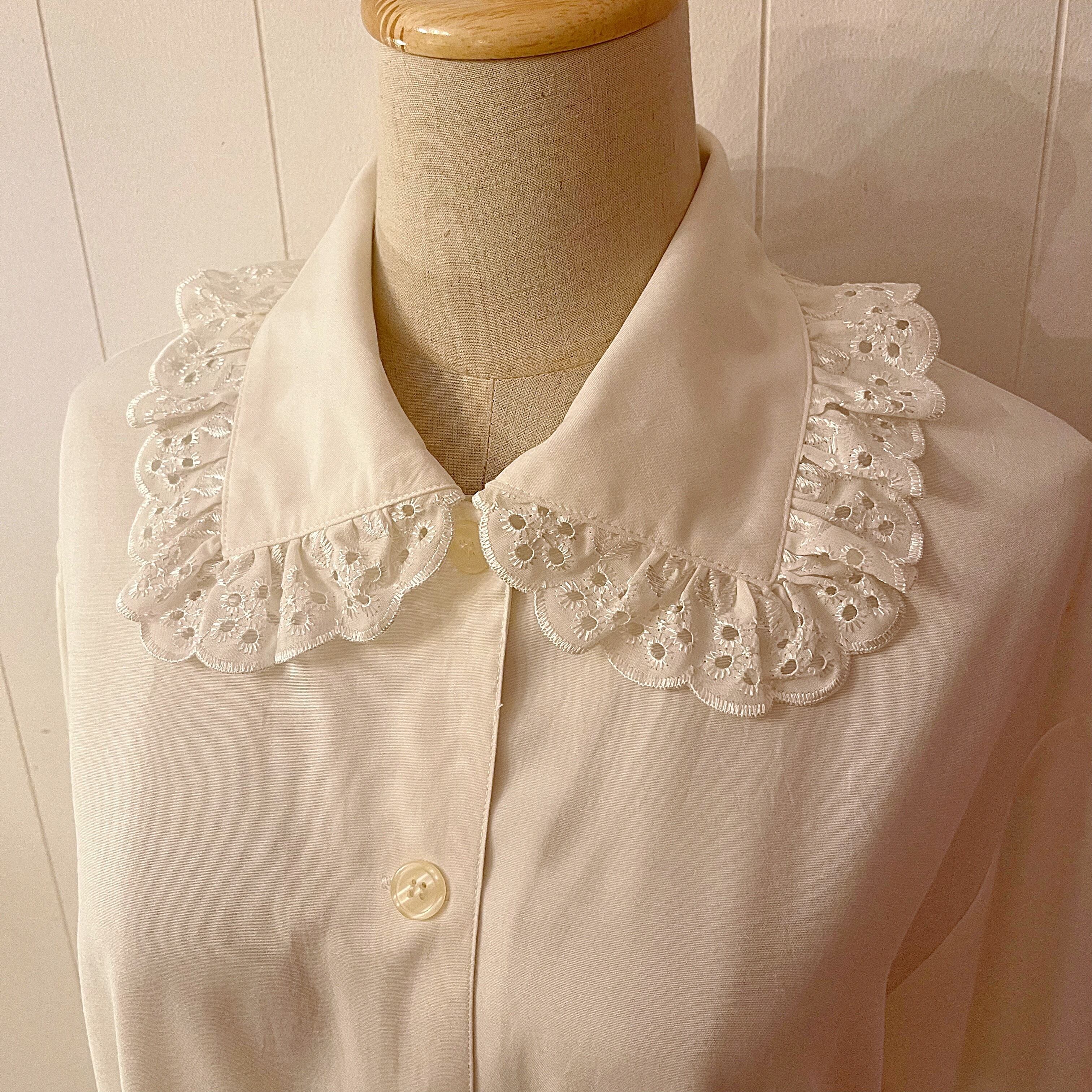 big frill cuffs white blouse