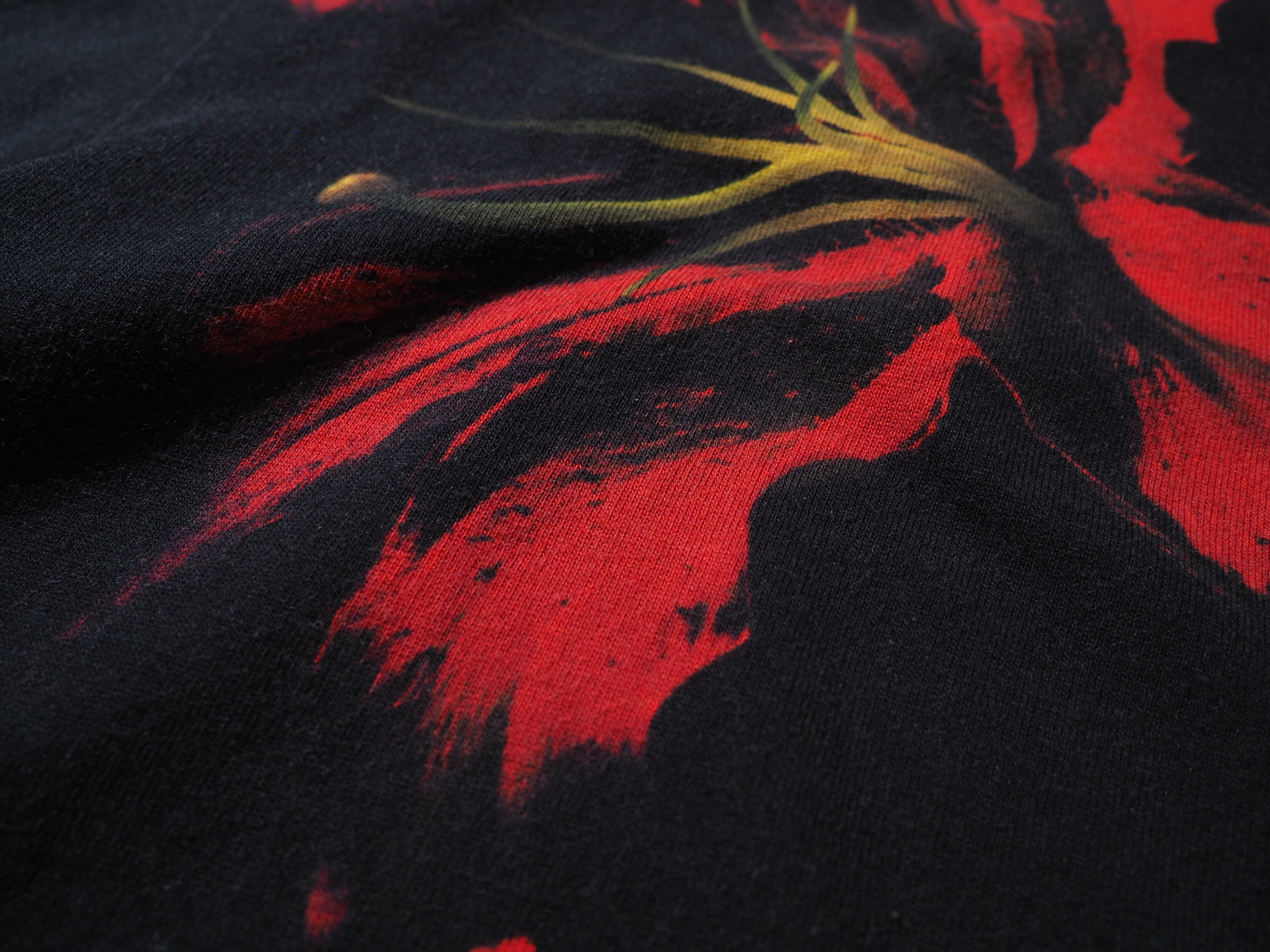 ” LAD MUSICIAN ” red lily painted loose black Tee