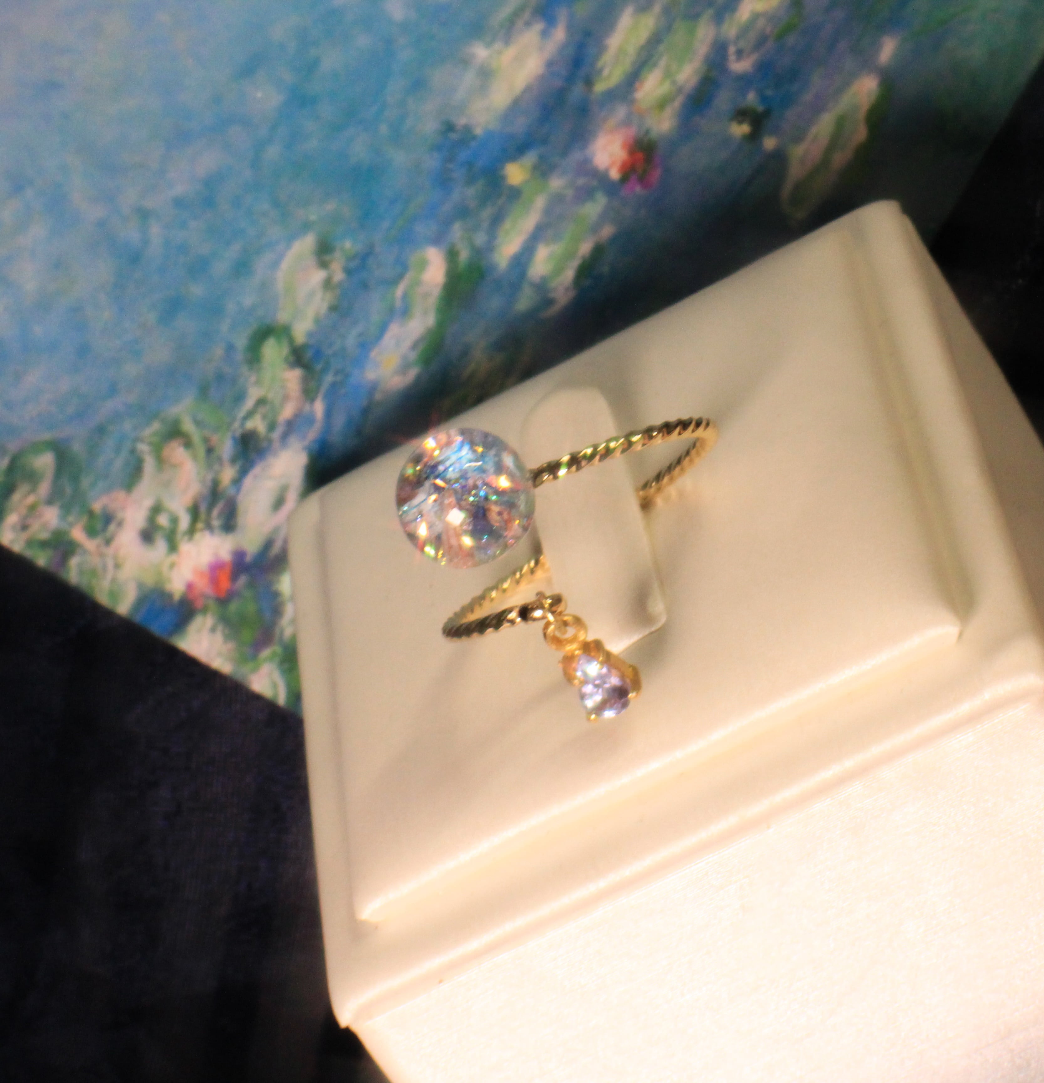 タンザナイト揺れる Lumière ring - mètèore モネ『睡蓮』を纏うリング