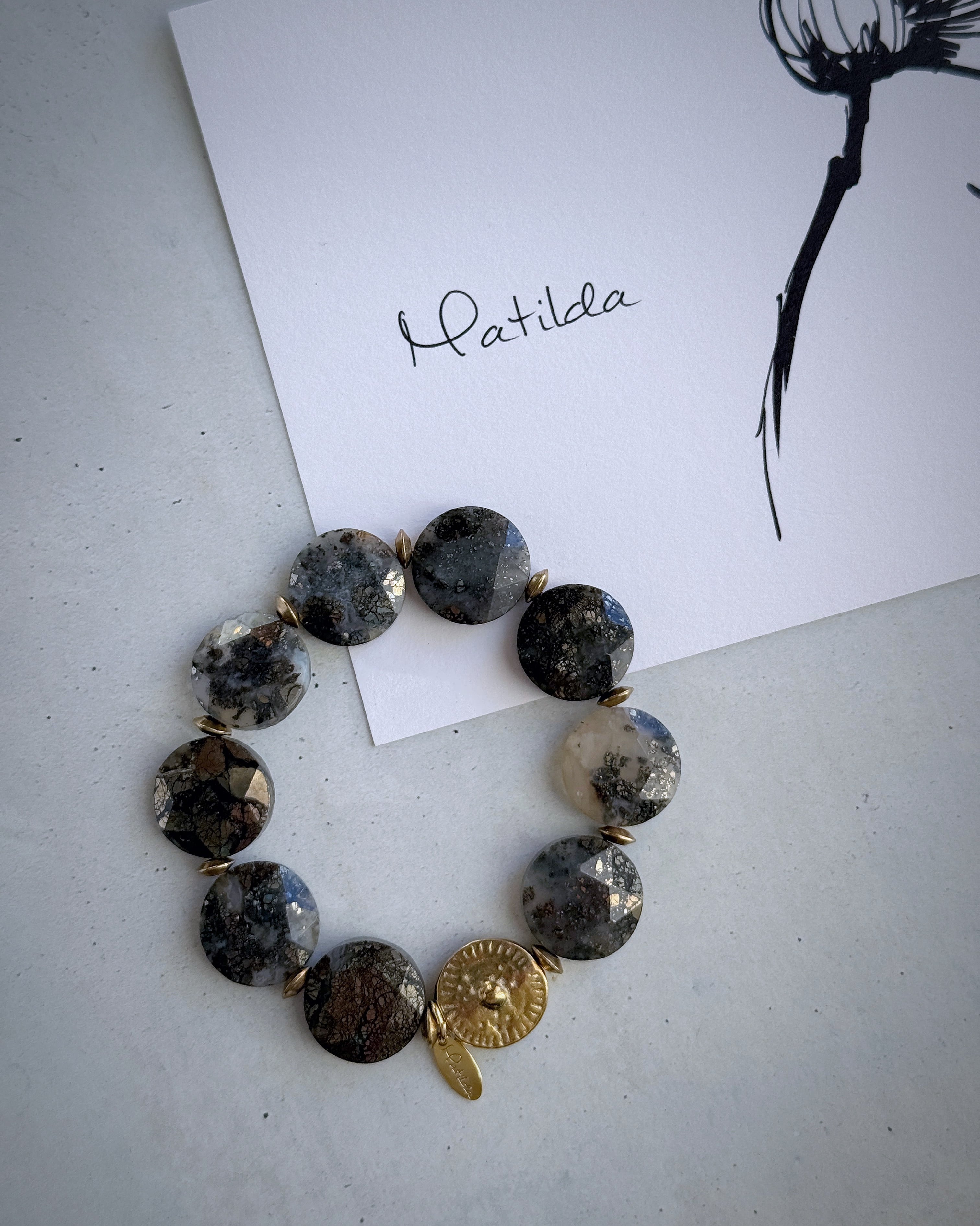 tumble bracelet(ニポモマーカサイト)