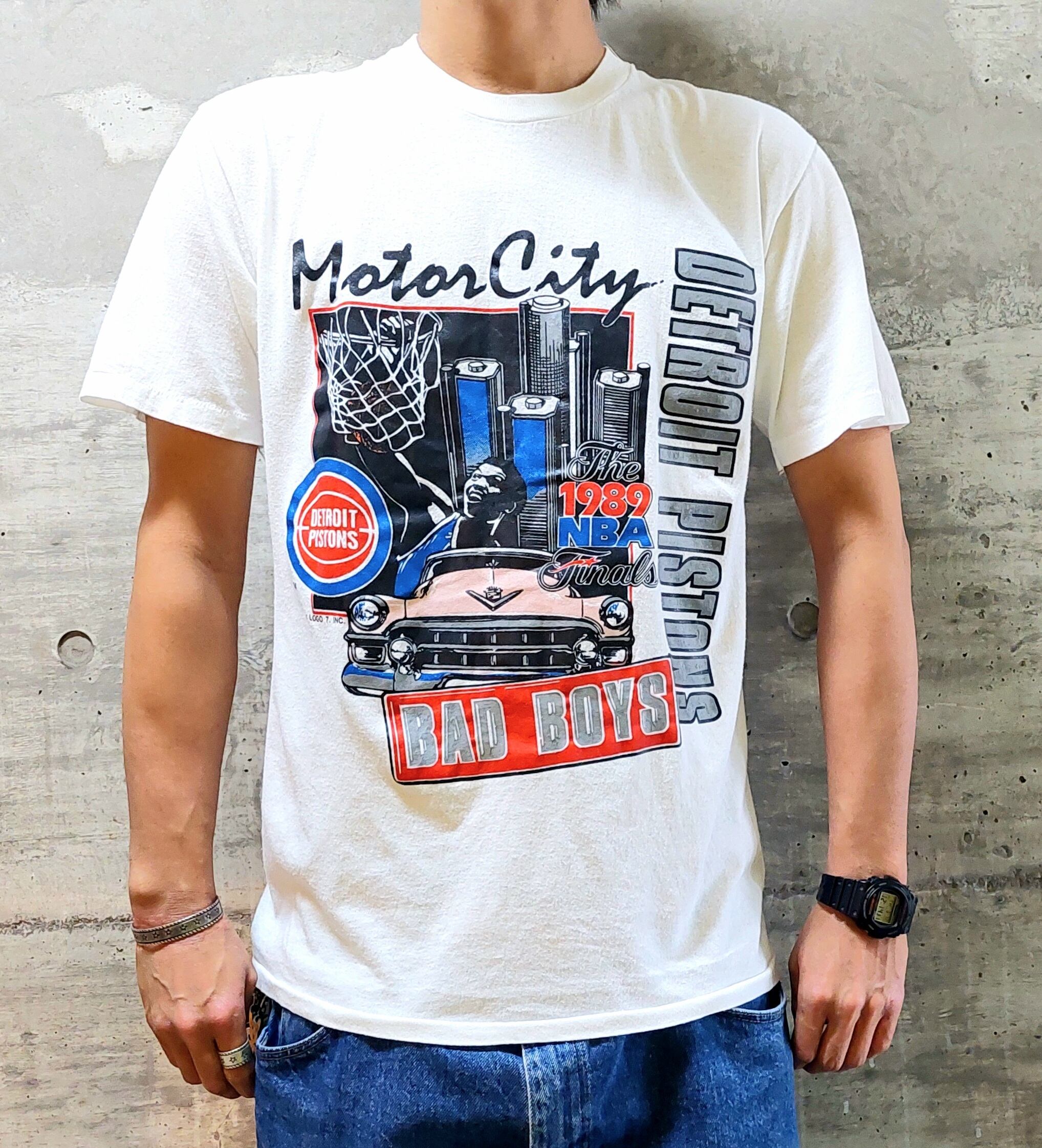 80年代 NBA DETROIT PISTONS 1989 EASTERN CONFERENCE CHAMPIONS チームロゴ プリントTシャツ メンズXL