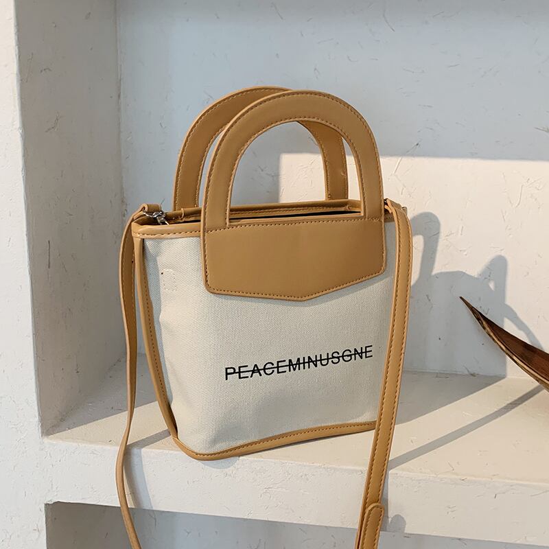 レディースバッグサマースモールバッグ2020ニュータイドネットレッドファッションカジュアルポータブルクロスボディバッグワイルドワイルドバケットバッグ Tiancai_Wing_Bag9351353