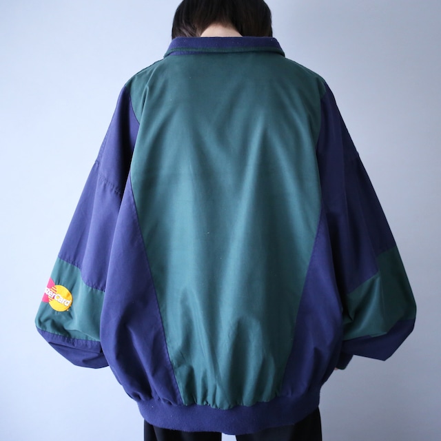 "Master Card" green × navy bi-color switching half-zip pullover