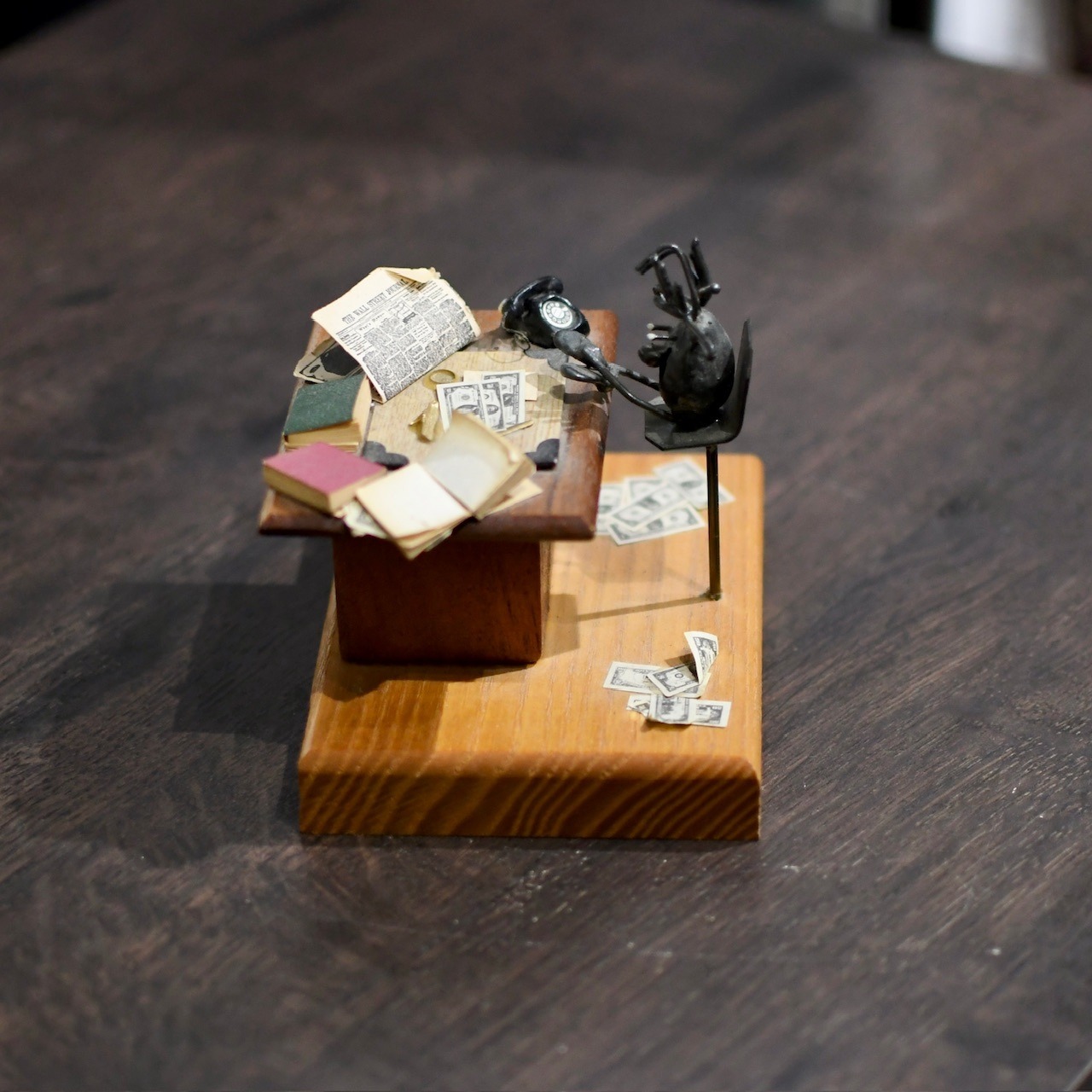 ~80's "foot on desk" scrap metal object