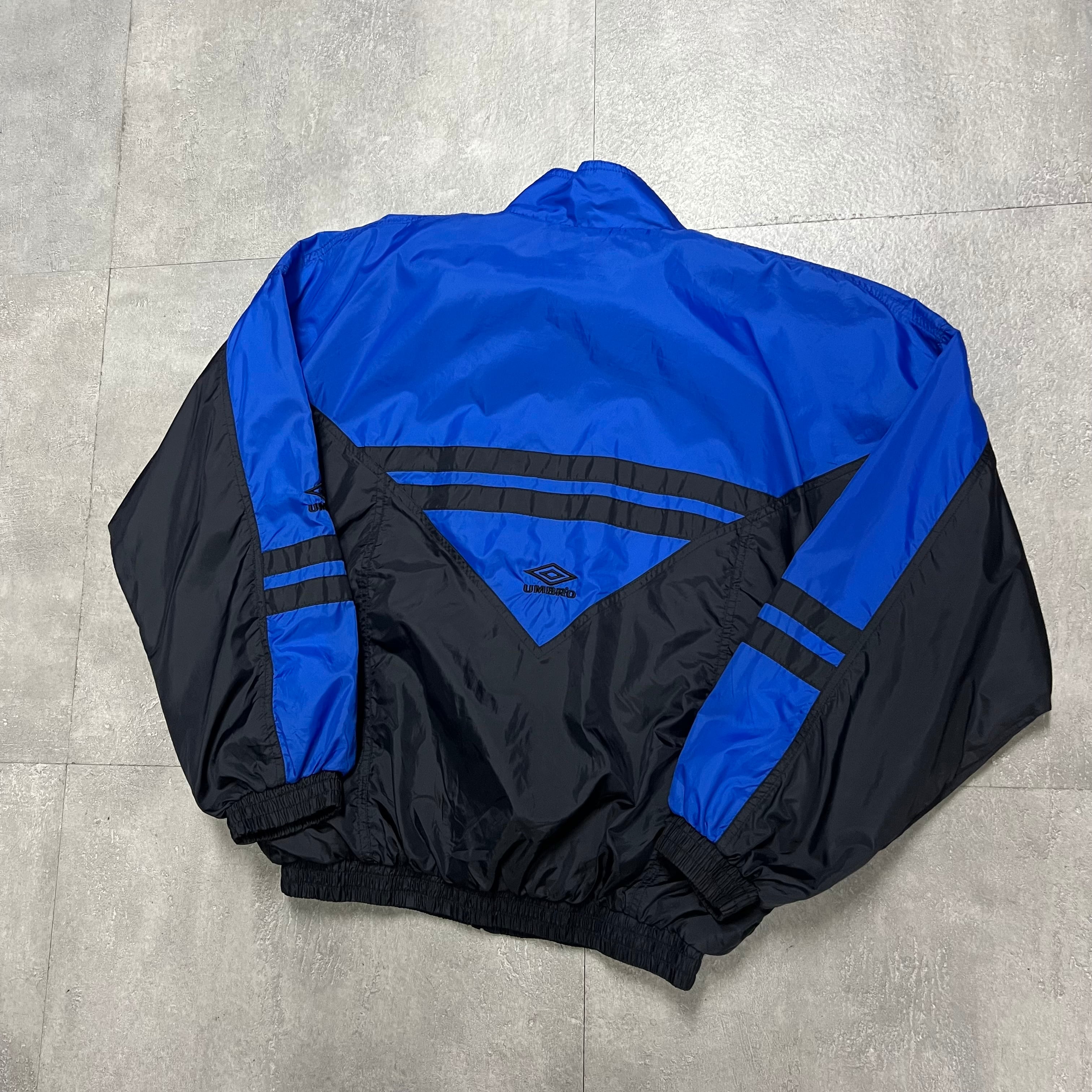 SC相模原　アンブロ　UMBRO ナイロンジャケット ブラック/ネイビー アンブロ ナイロンジャケット 黒 Umbro ナイロンジャケット ブラック