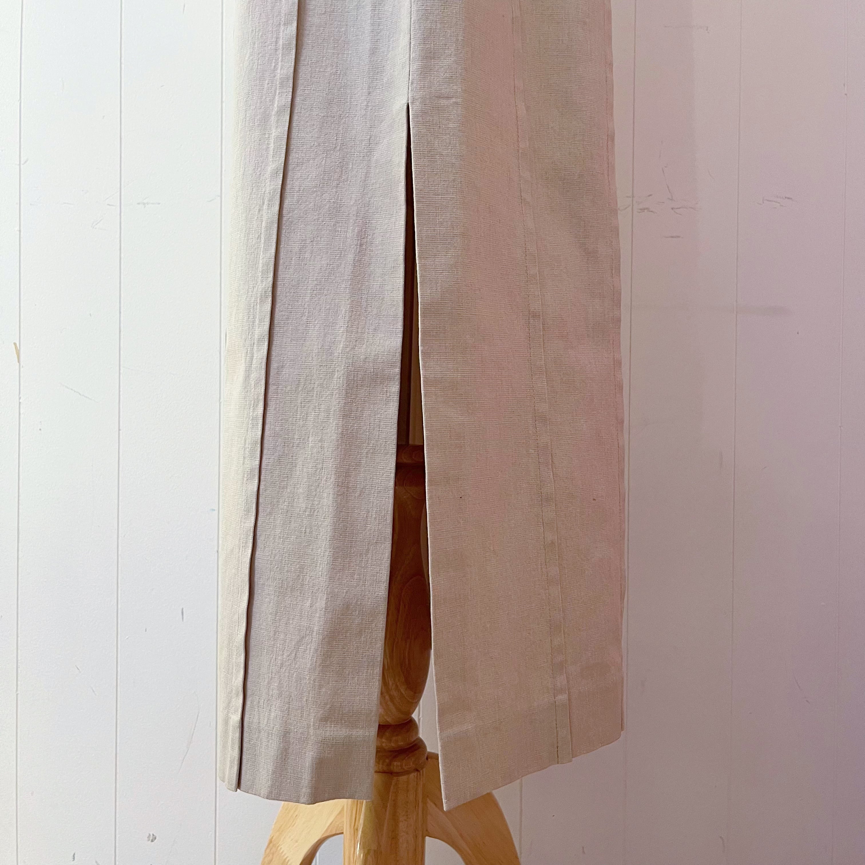 beige pleats side slit long skirt