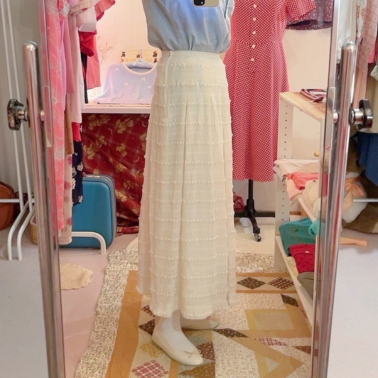 NINARICCI / mini ponpon white flare skirt