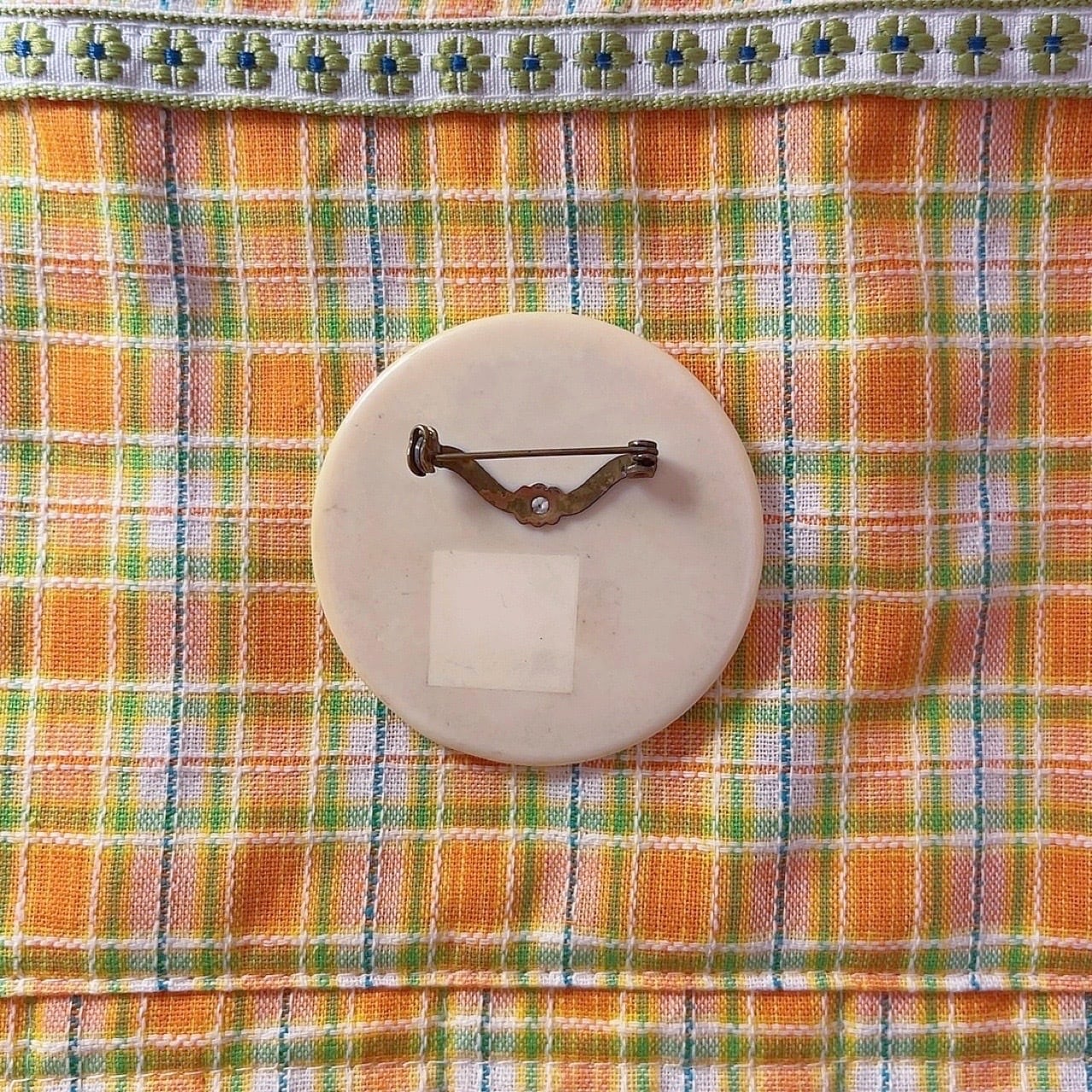 yellow floral round brooch