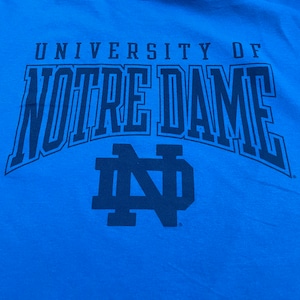 【ALTA GRACIA】カレッジ ロゴ Tシャツ ノートルダム大学 University of Notre Dame プリント 半袖 LARGE ブルー us古着