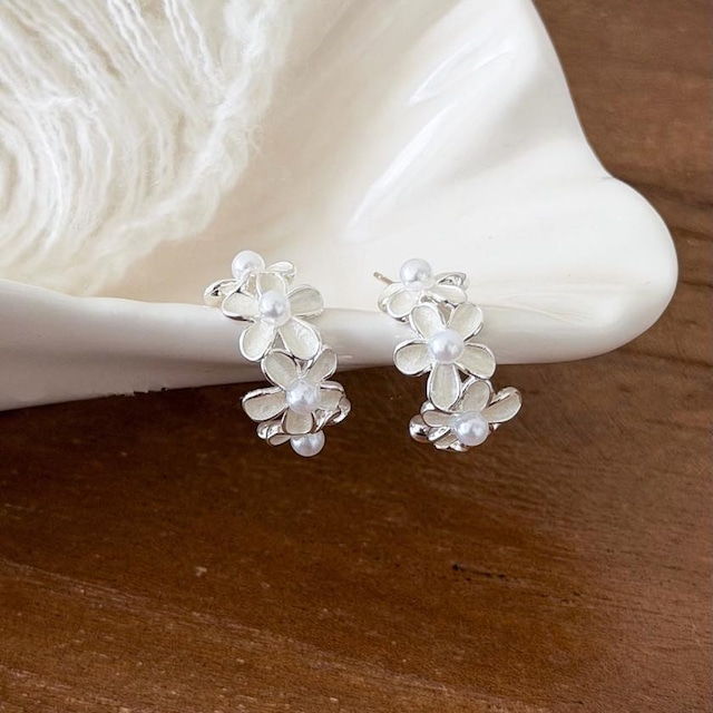 feminine flower half-hoop pierce