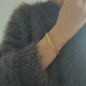 ラインストーンウェーブバングル<MU select>