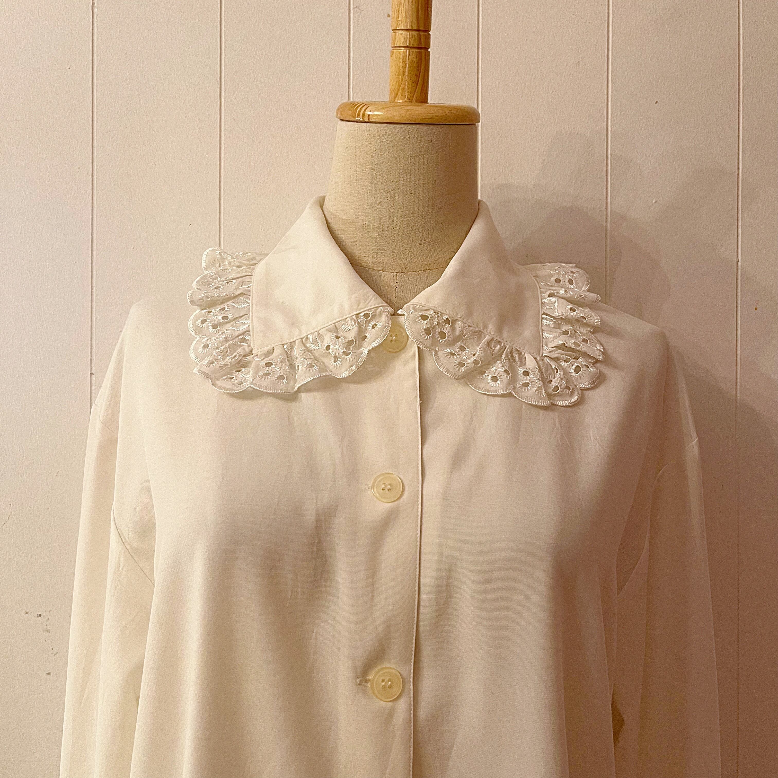big frill cuffs white blouse