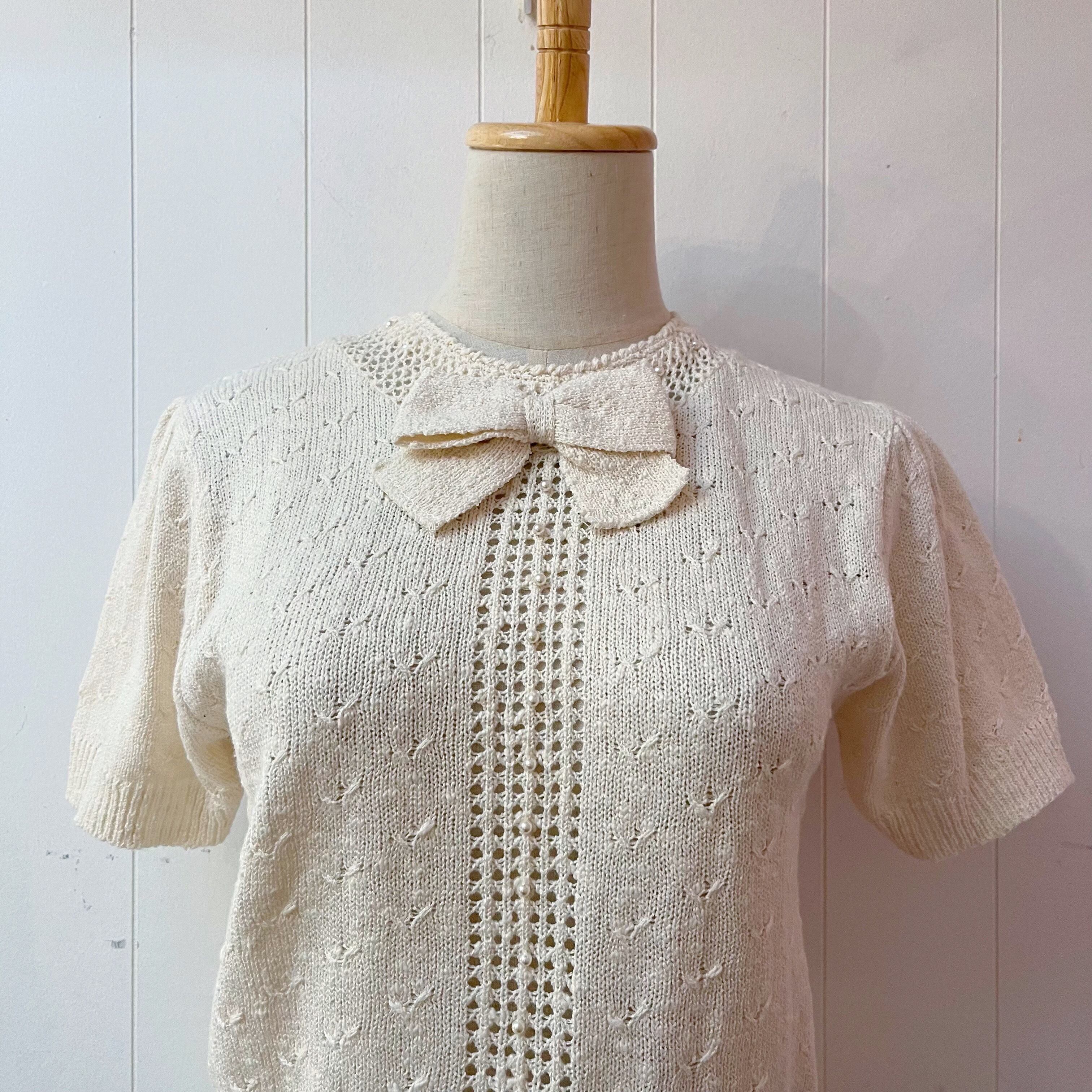 ribbon brooch off white knit po