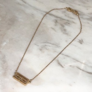 vintage GIVENCHY gold color metal " G " pendant necklace