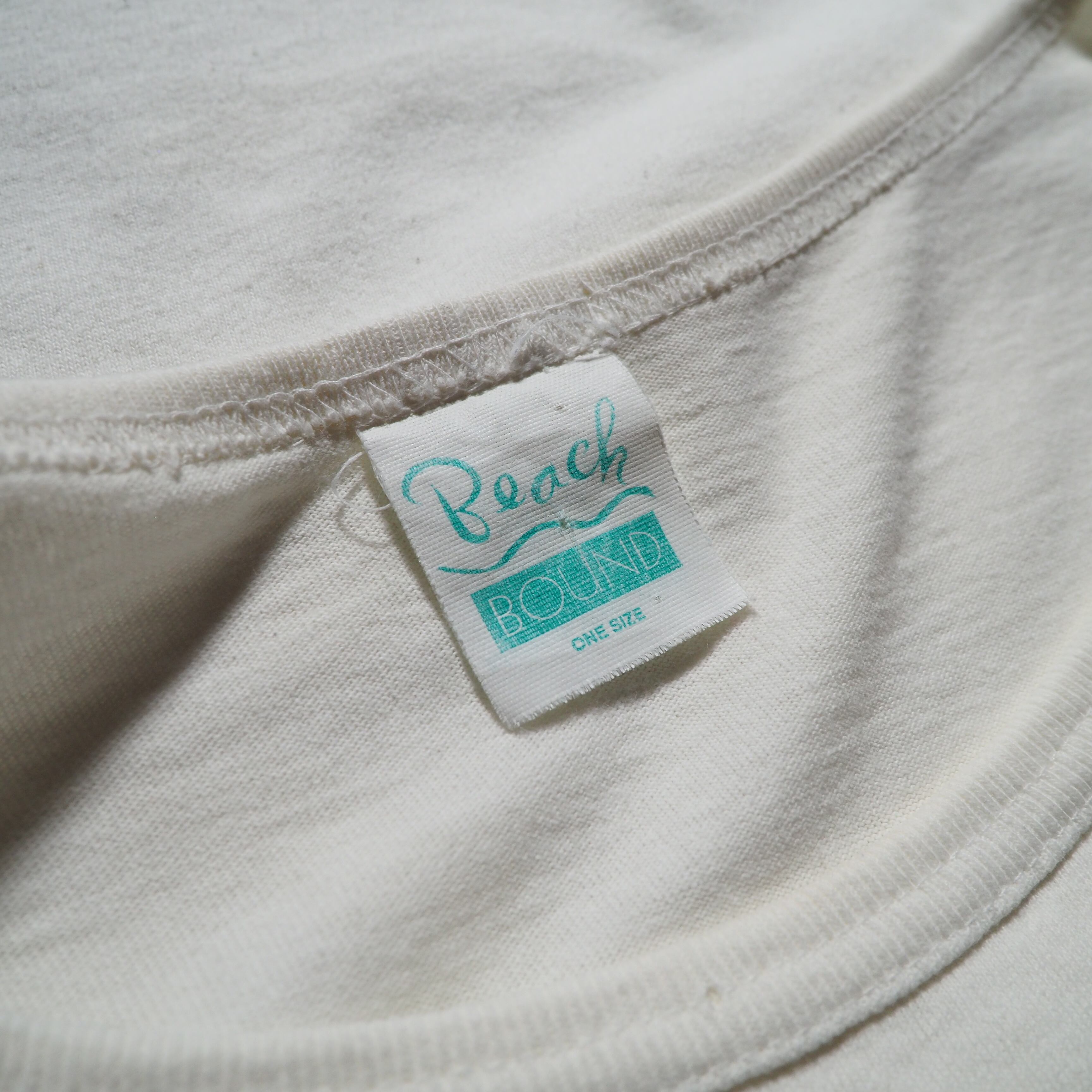 1990s ” Beach Bound ” Big Pocket Embbossed vintage loose SS Tee (made in Usa)