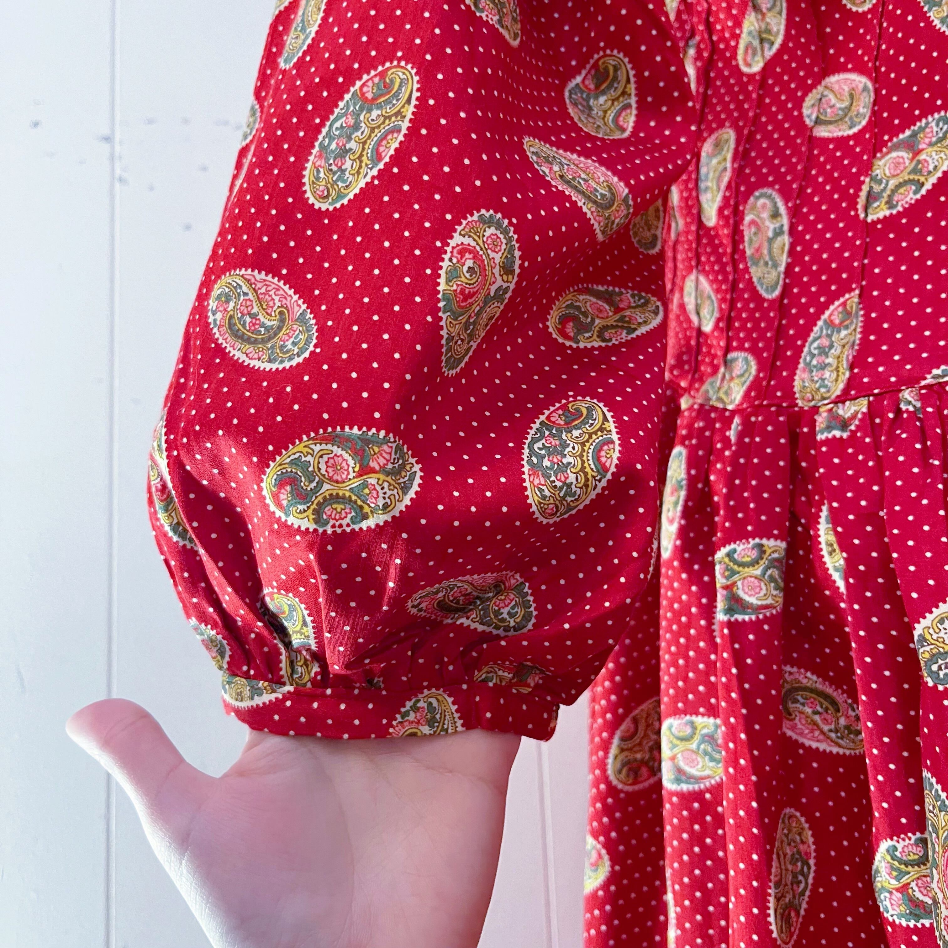 red paisley dot back button one-piece