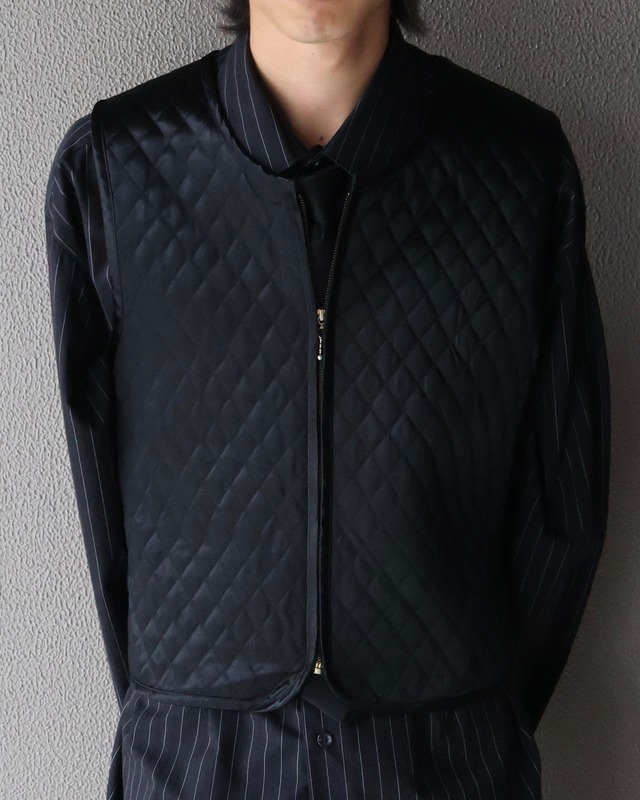Quilted short length zip vest
