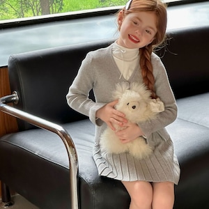 秋リボン付きハイネックTシャツ