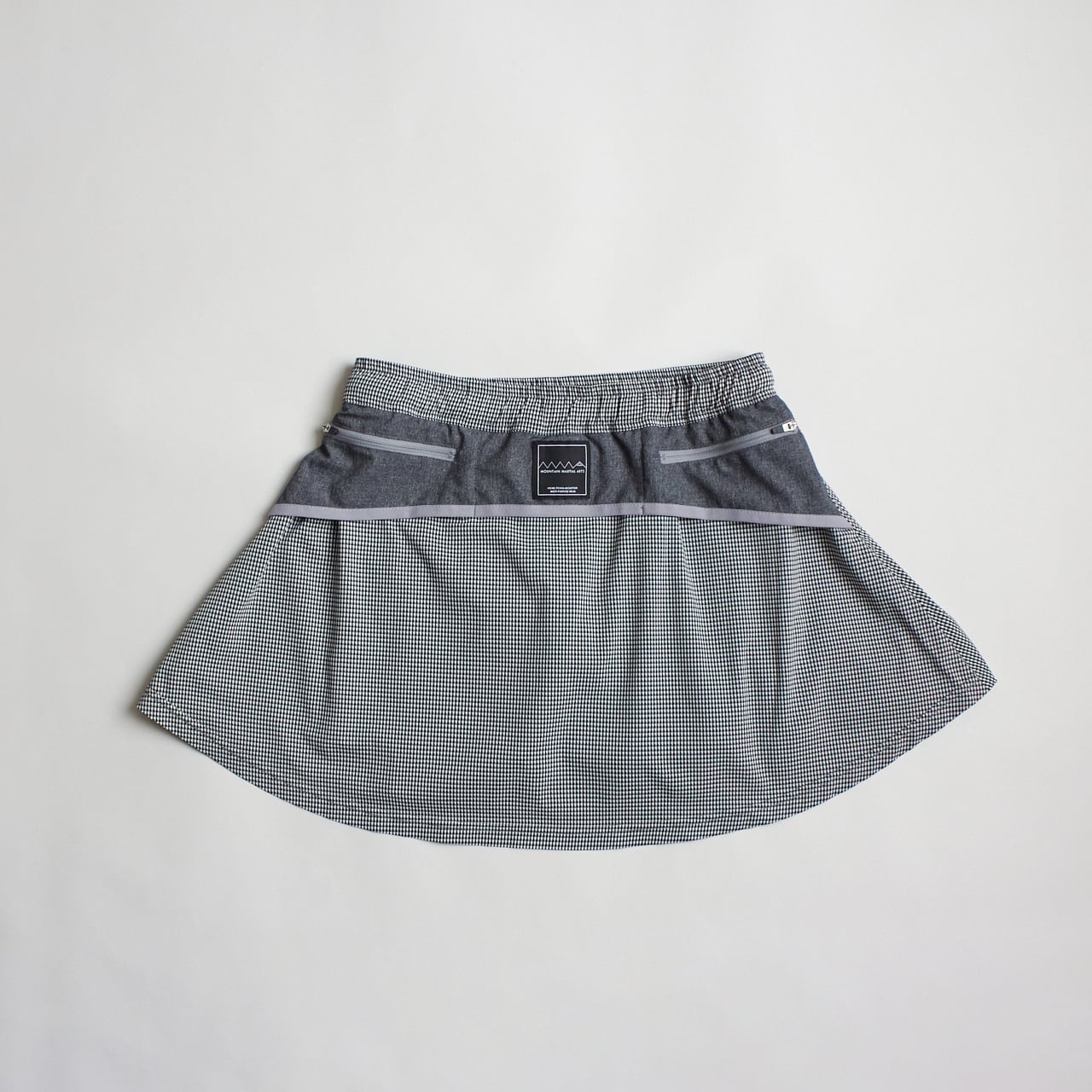MMA（マウンテンマーシャルアーツ）MMA Front Pleats Run Skirt -Gray