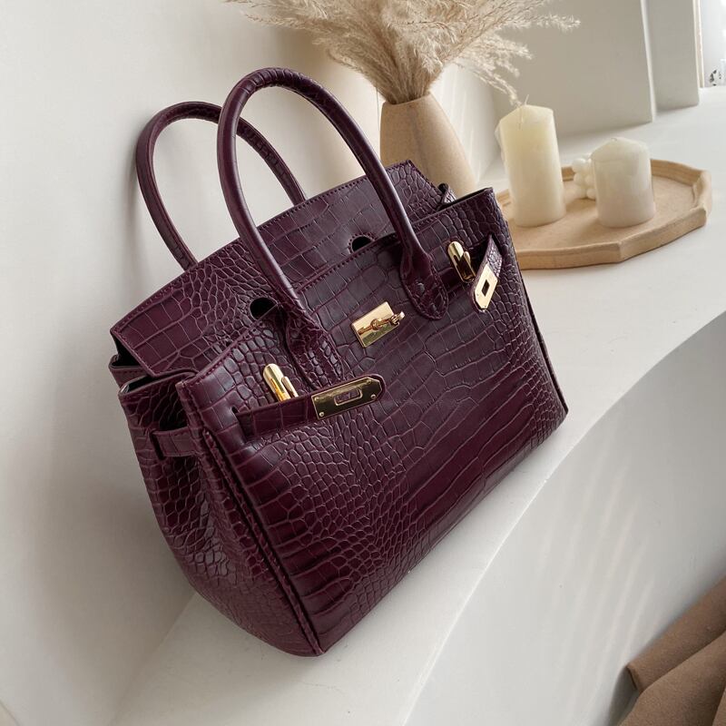 ヨーロッパとアメリカのファッションウエスタンスタイルのハンドバッグ2020ワイルドテクスチャメッセンジャーバッグの新しいトレンディなバージョン雰囲気のあるハンドバッグケリーバッグ 手作りハンドバック82086538019