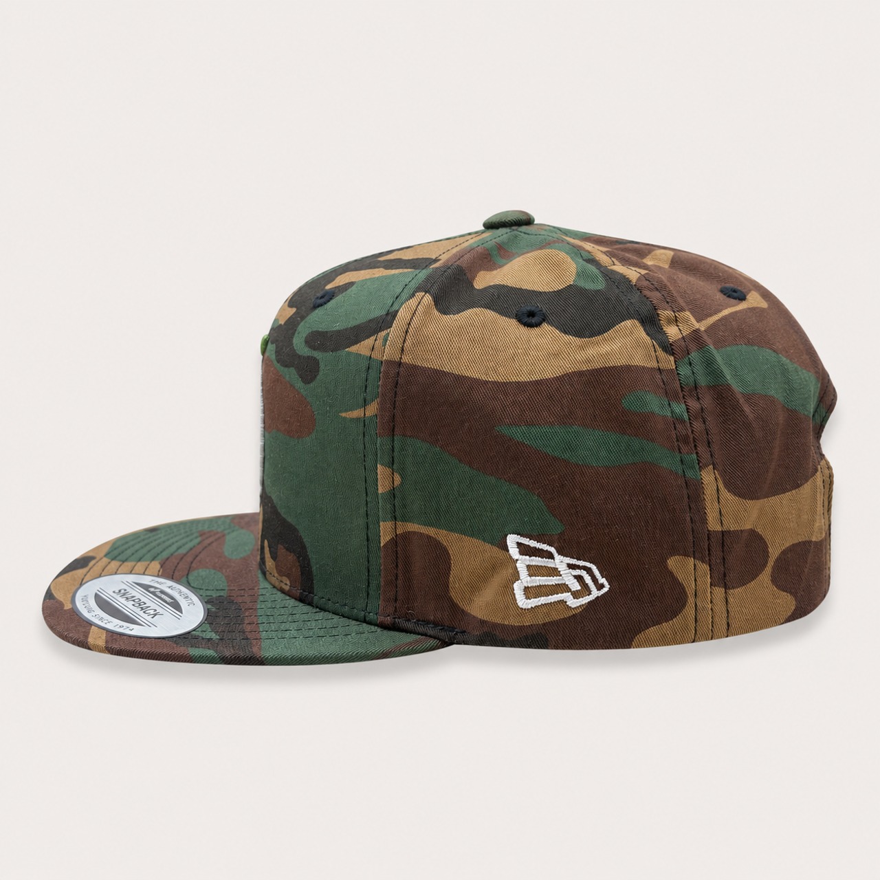 SANPACHI REGION SNAPBACK CAP WOODLAND CAMO