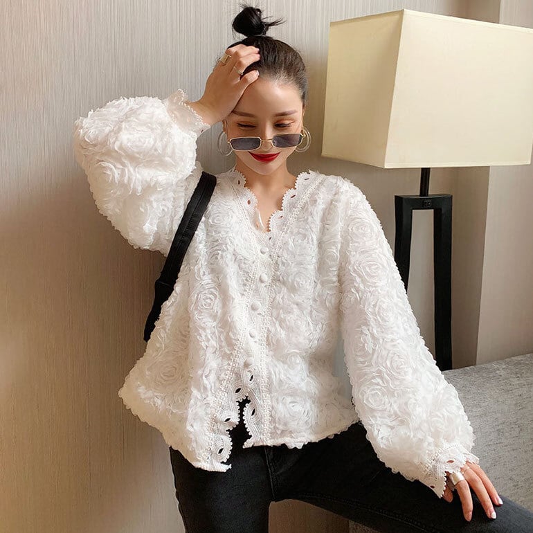 花柄レースのカーディガン 引張 