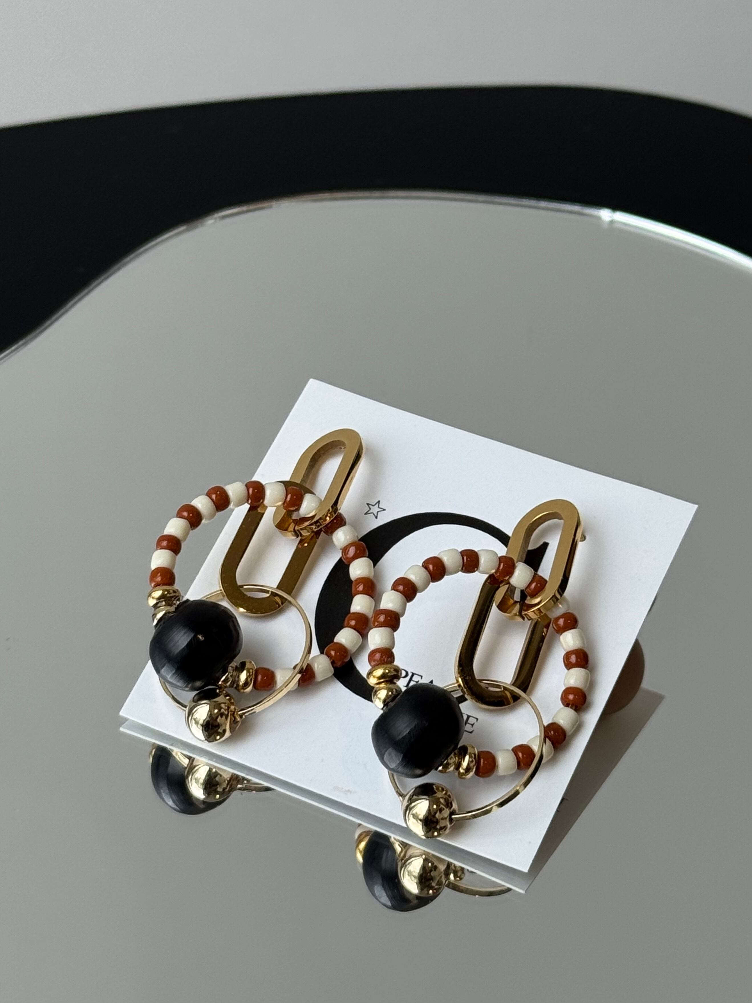 gold chain brown tone circle