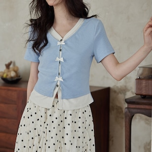 small blue faux two piece short sleeved t shirt